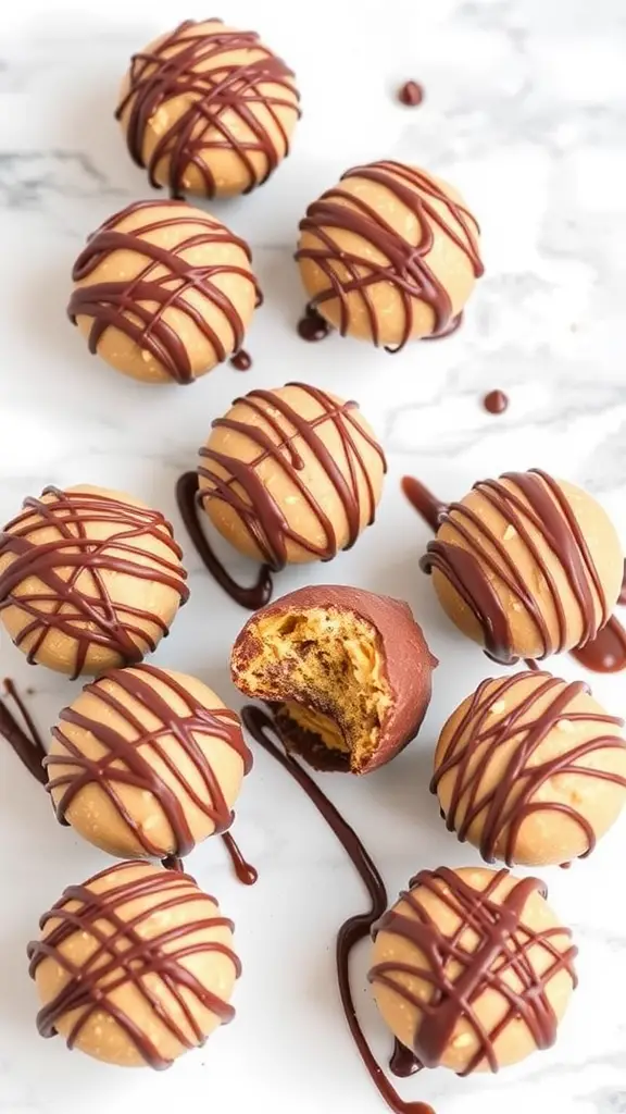 A close-up of keto peanut butter cup fat bombs drizzled with chocolate, with one bomb bitten into.