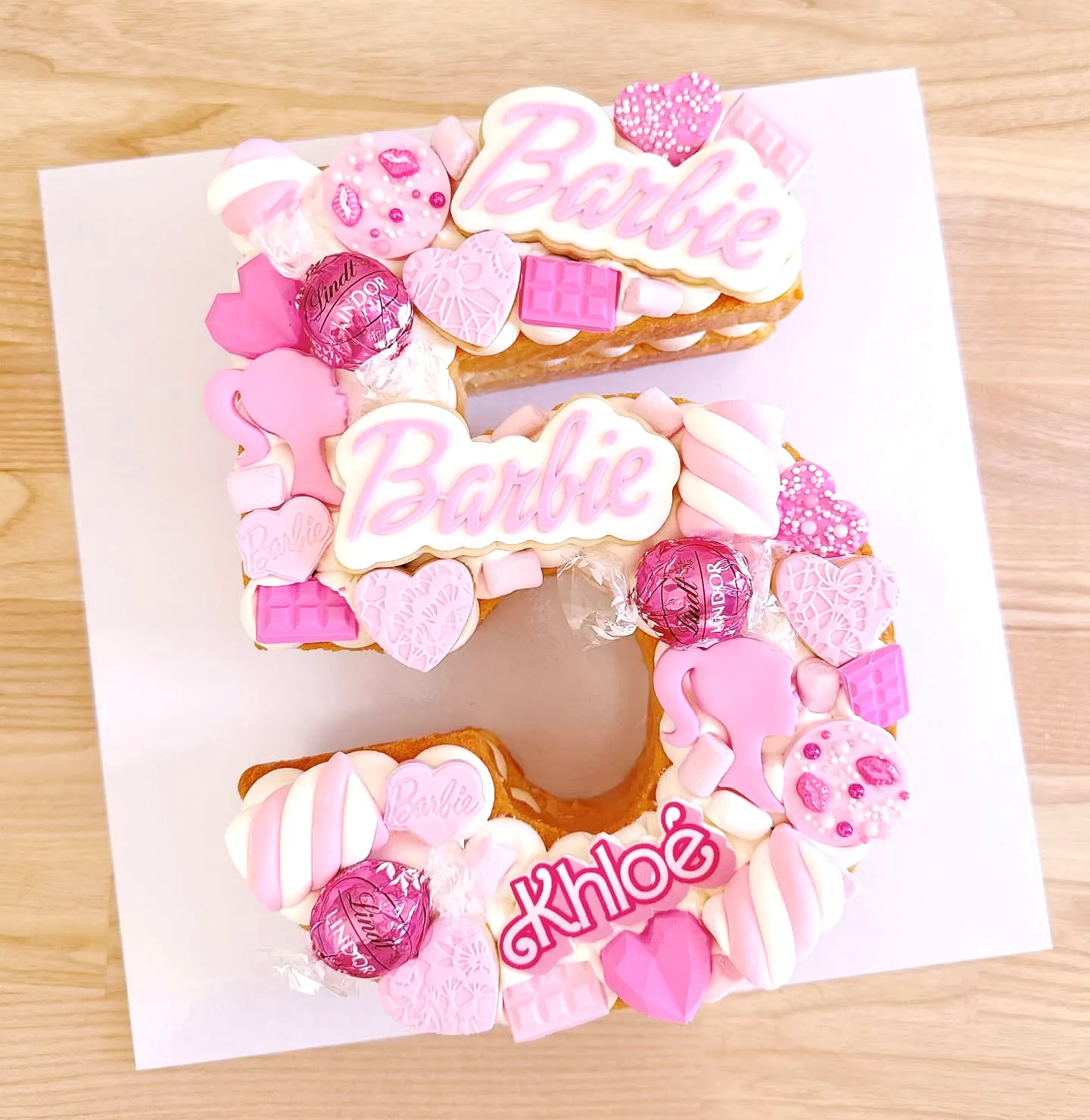 Adorable Barbie Birthday Cake Design in Vibrant Pink Theme for Khloe
