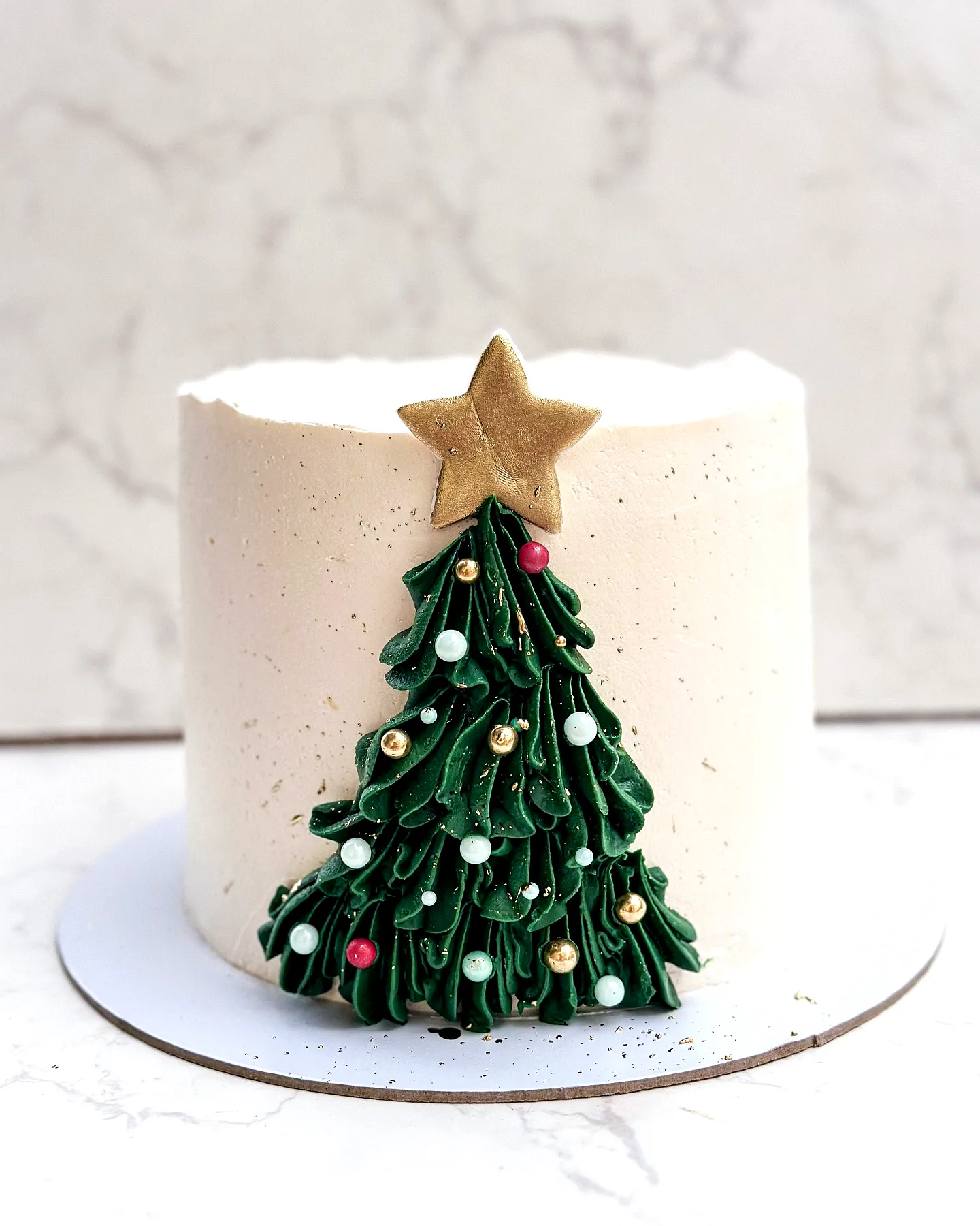 Adorable Christmas Cake with Festive Tree Design and Colorful Decorations