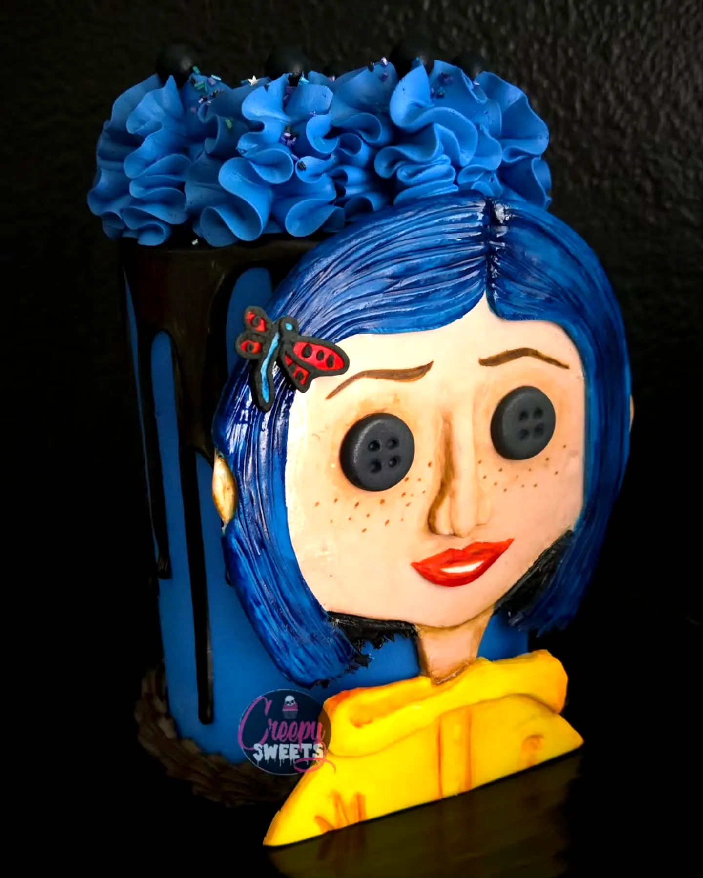 Adorable Coraline Birthday Cake Design with Whimsical Colors and Fun Details