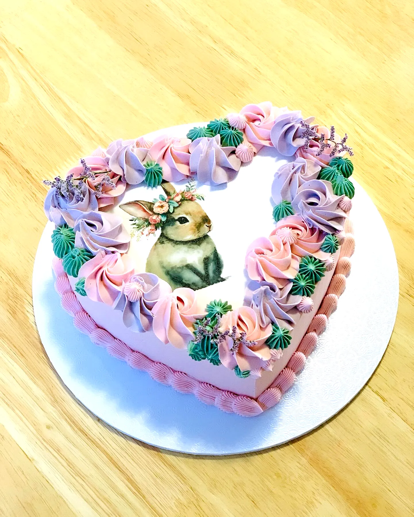 Adorable Easter Bunny Cake Design with Pastel Buttercream and Floral Touches
