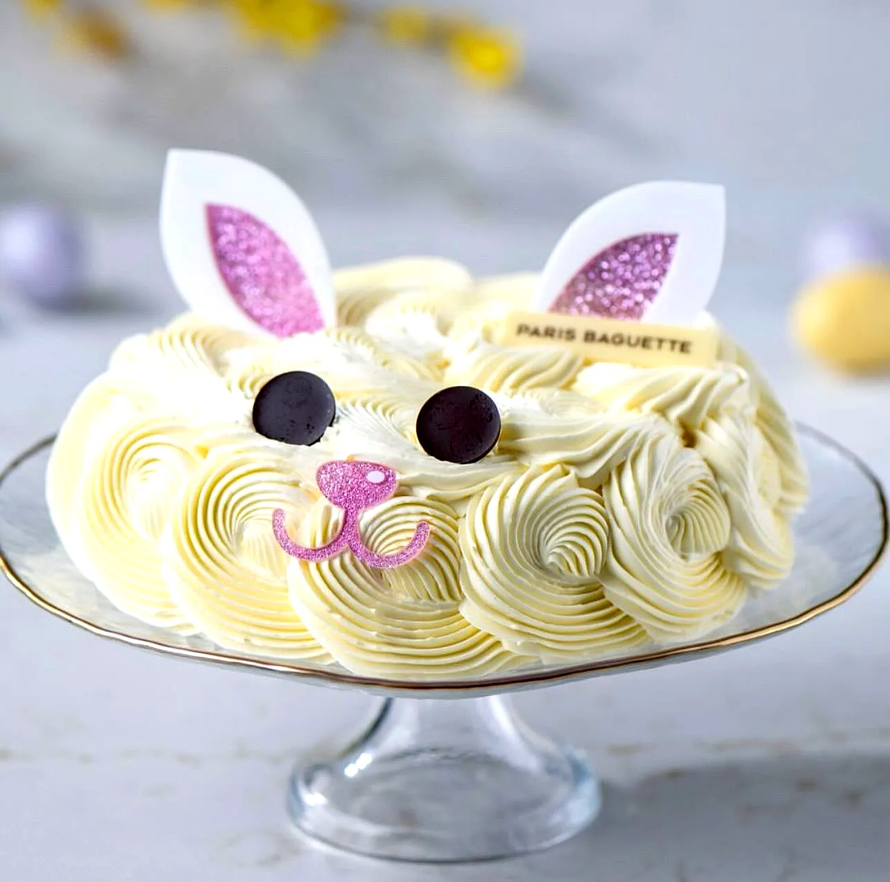 Adorable Easter Bunny Cake Design with Swirled Frosting and Playful Colors