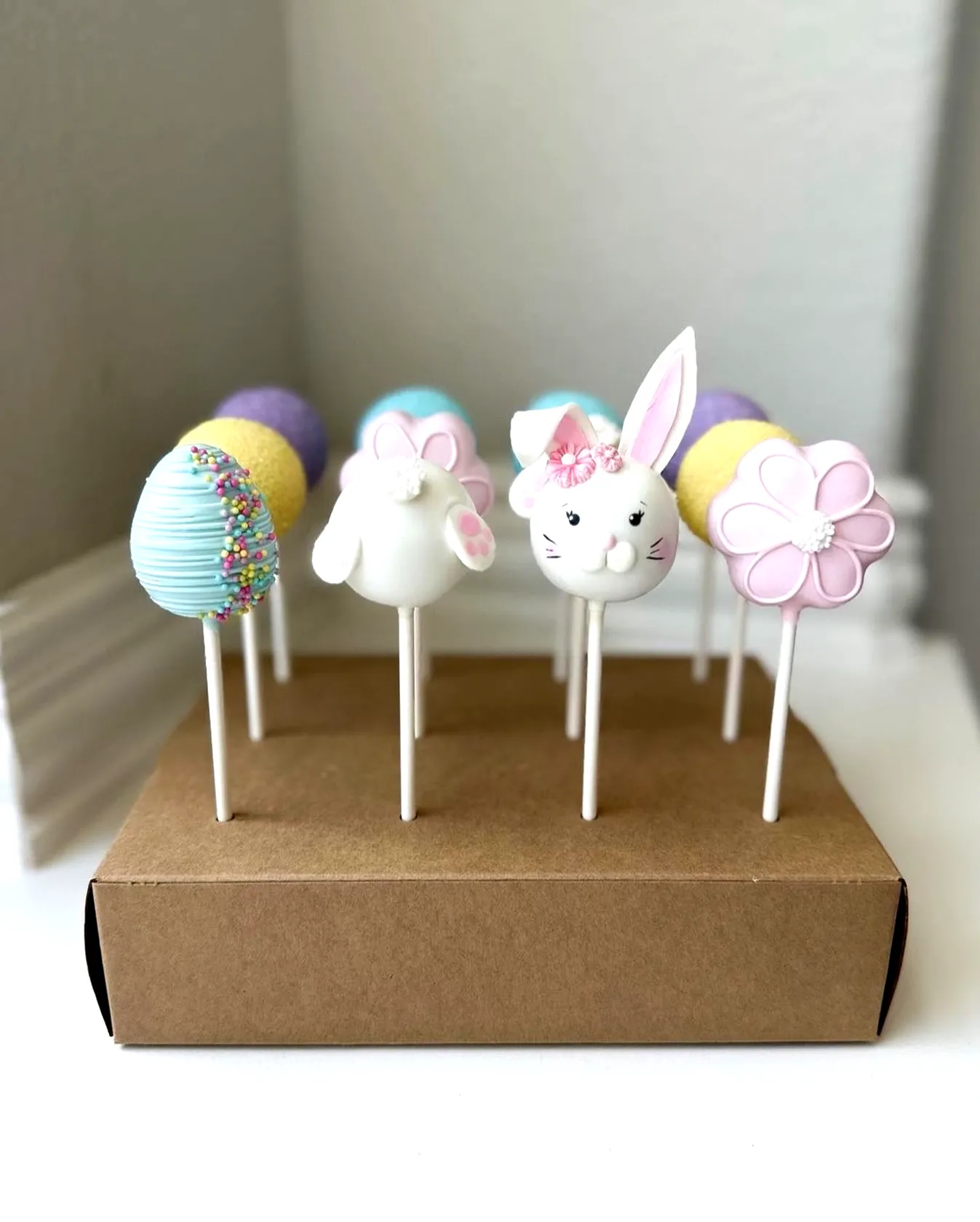 Adorable Easter Cake Pops in Colorful Egg and Cute Rabbit Designs