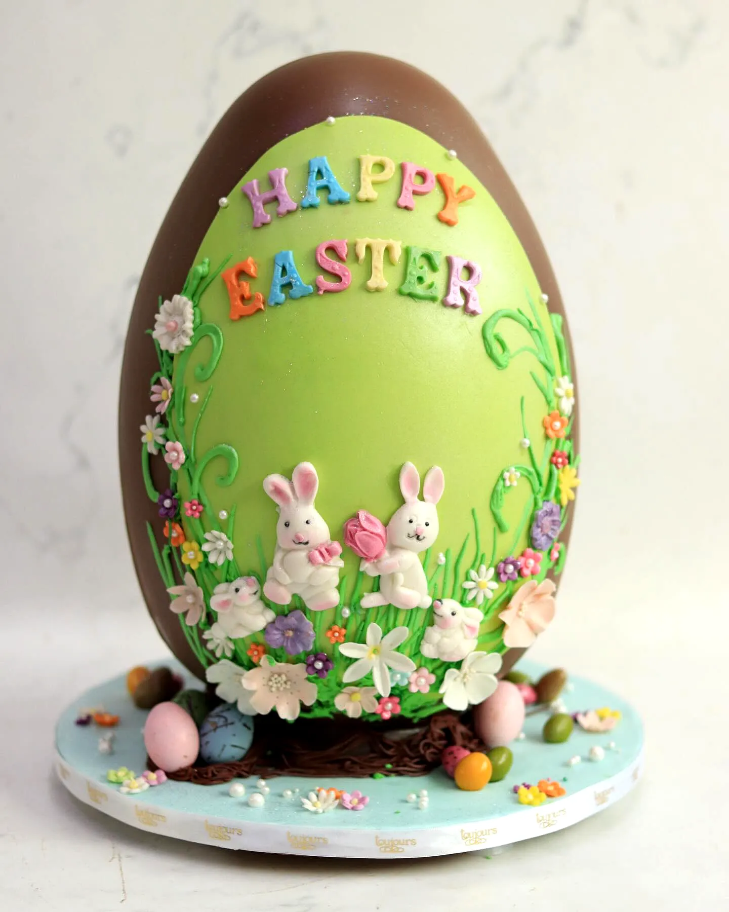 Adorable Easter Egg Cake Design with Colorful Decorations and Fun Details
