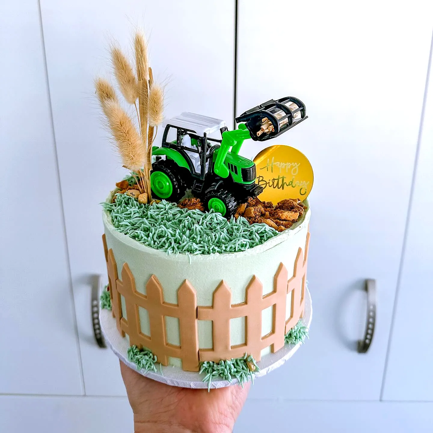 Adorable Farming Birthday Cake Design with Tractor and Lush Grass Texture