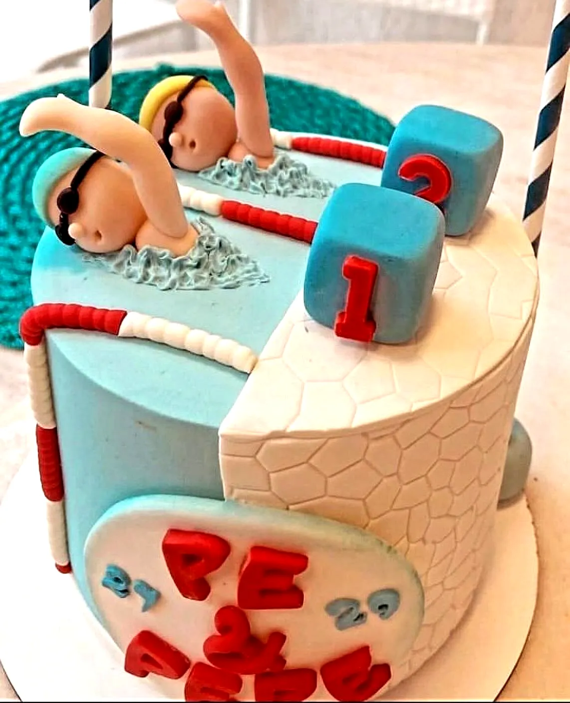 Adorable Funny Birthday Cake Design in a Colorful Swimming Pool Theme