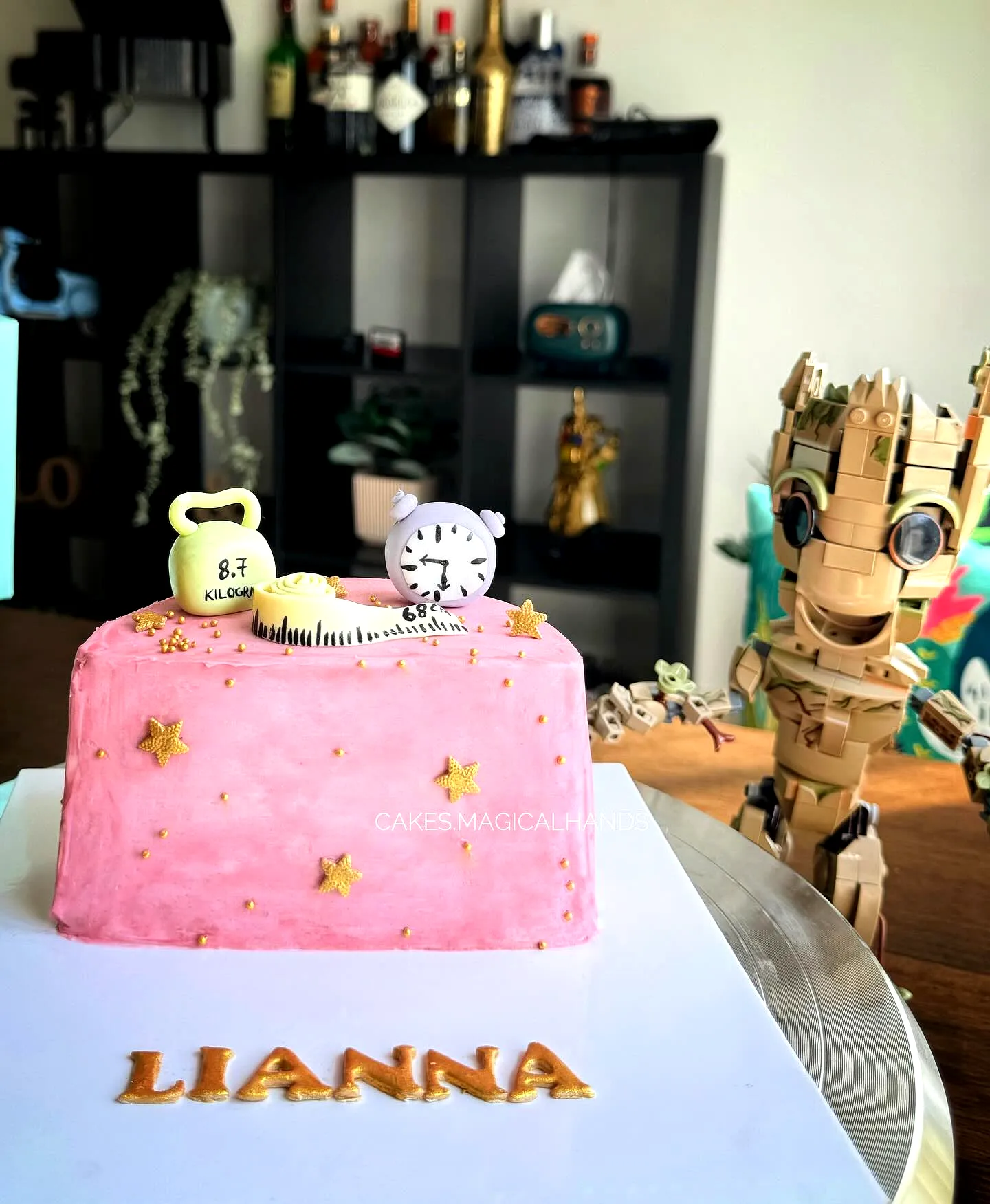 Adorable Half Birthday Cake Design with Pink Buttercream and Gold Accents