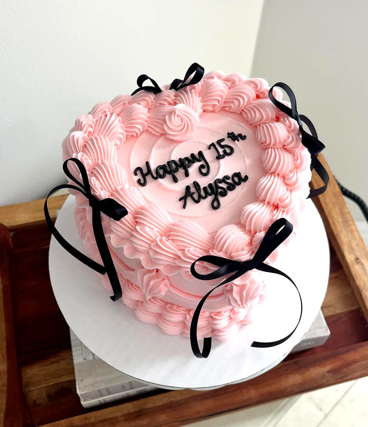Adorable Heart-Shaped 15th Birthday Cake Design in Soft Pink Buttercream