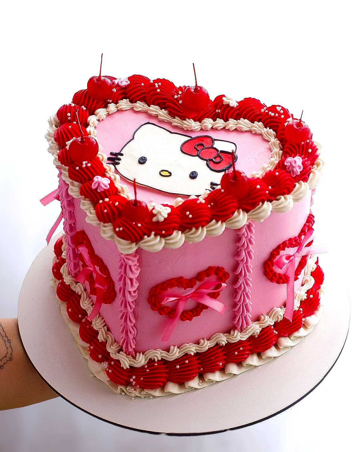 Adorable Hello Kitty Cake Design in Heart Shape with Pink Buttercream