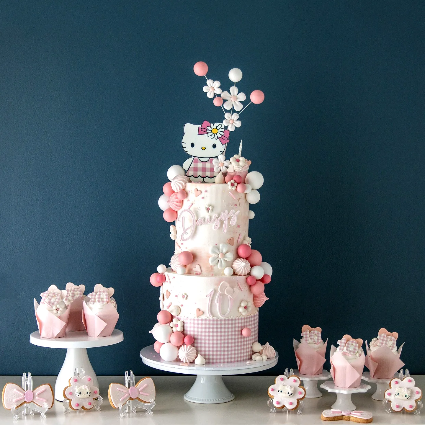 Adorable Hello Kitty Cake Design with Whimsical Colors and Fun Decorations