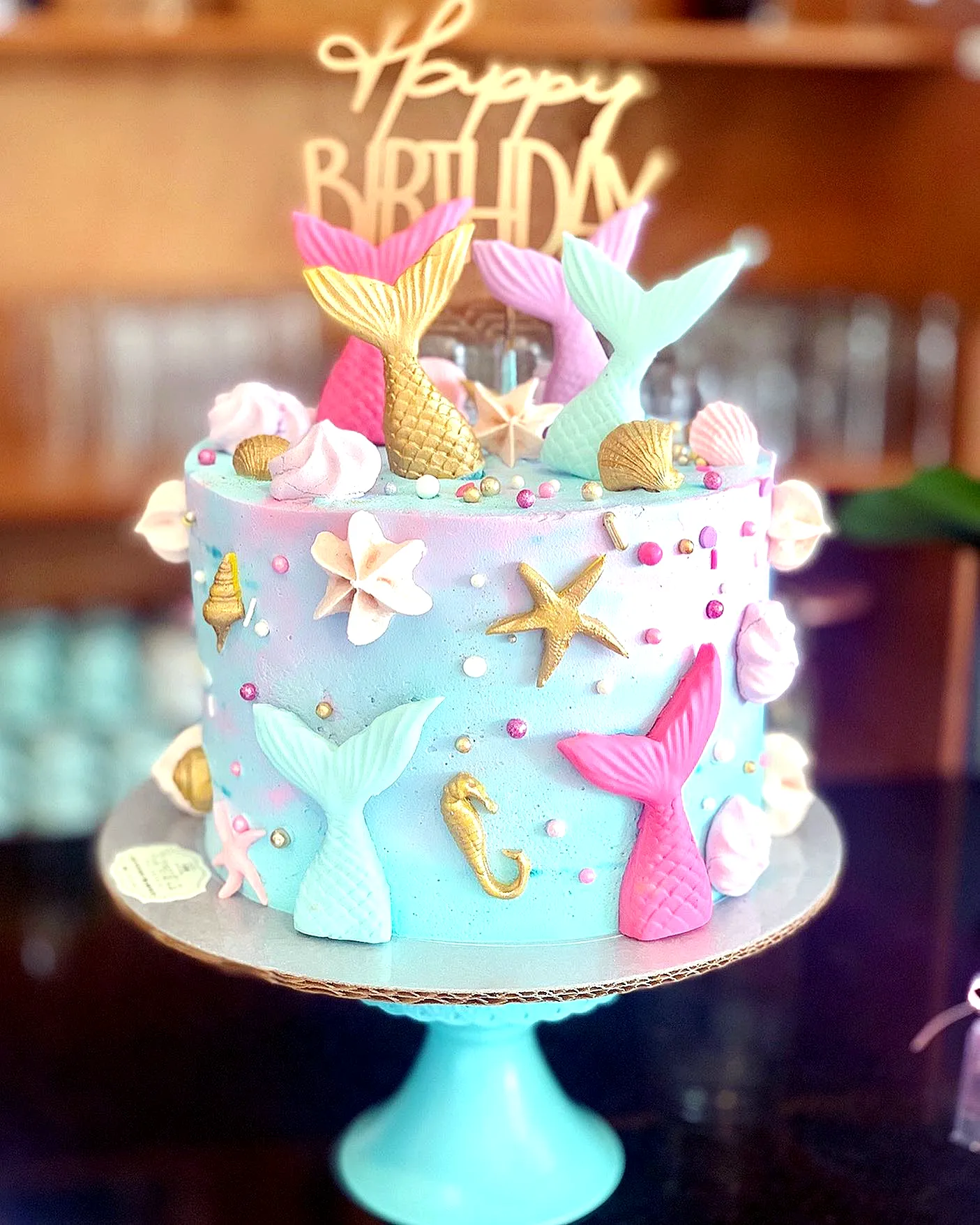 Adorable Mermaid Cake Design in Pastel Colors with Fun Oceanic Decorations