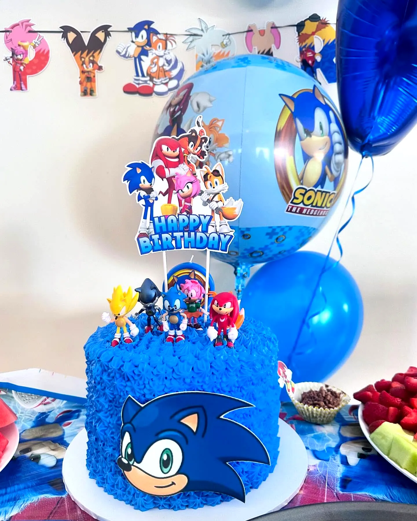 Adorable Sonic Birthday Cake in Fun Cartoon Style with Colorful Decorations