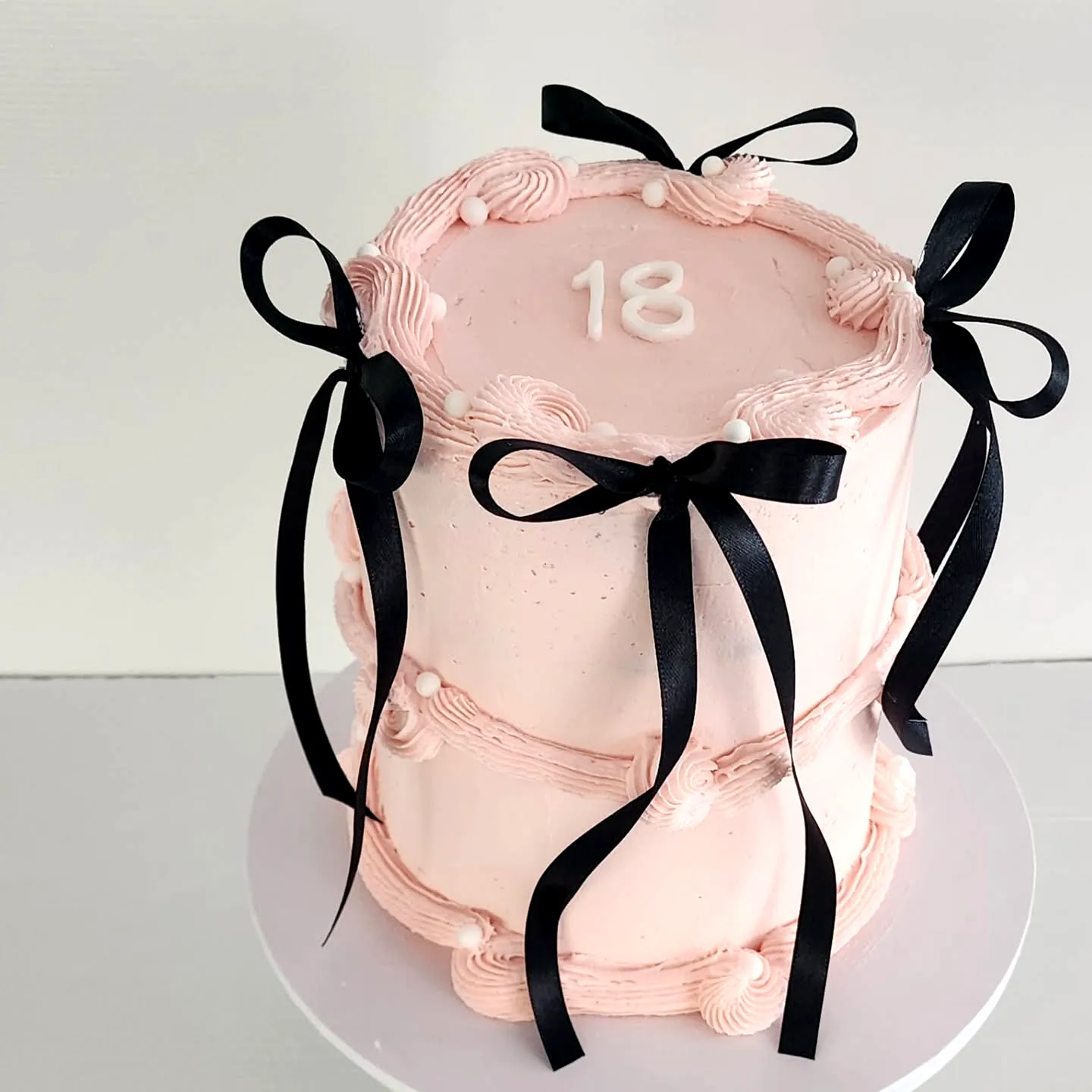 Charming 18th Birthday Cake Design in Soft Pink with Elegant Details
