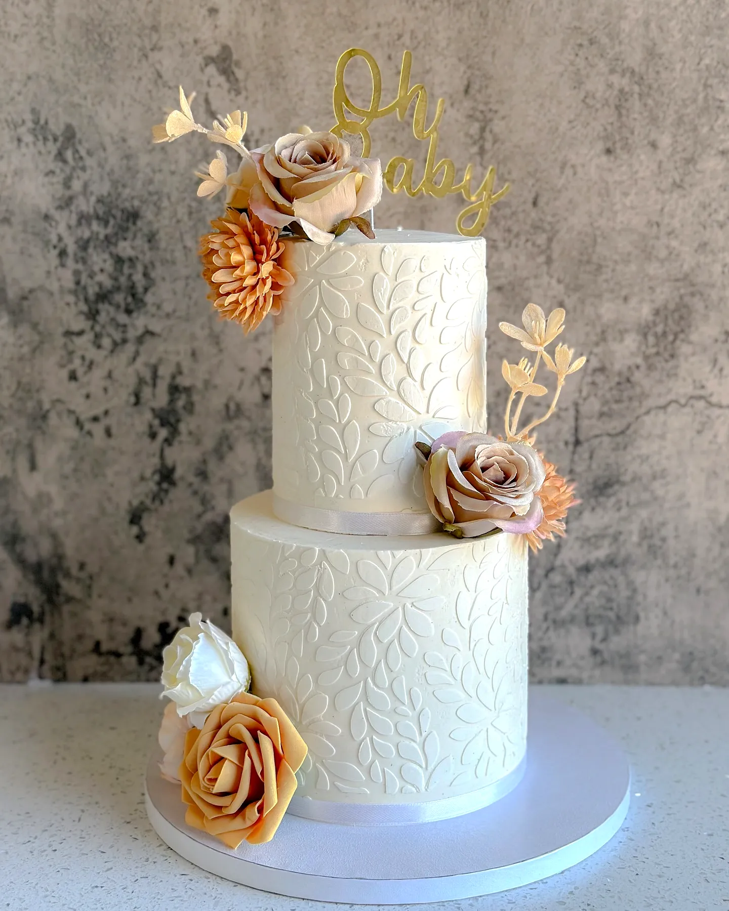 Charming 2 Tier Wedding Cake with Modern Floral Design and Elegant Accents