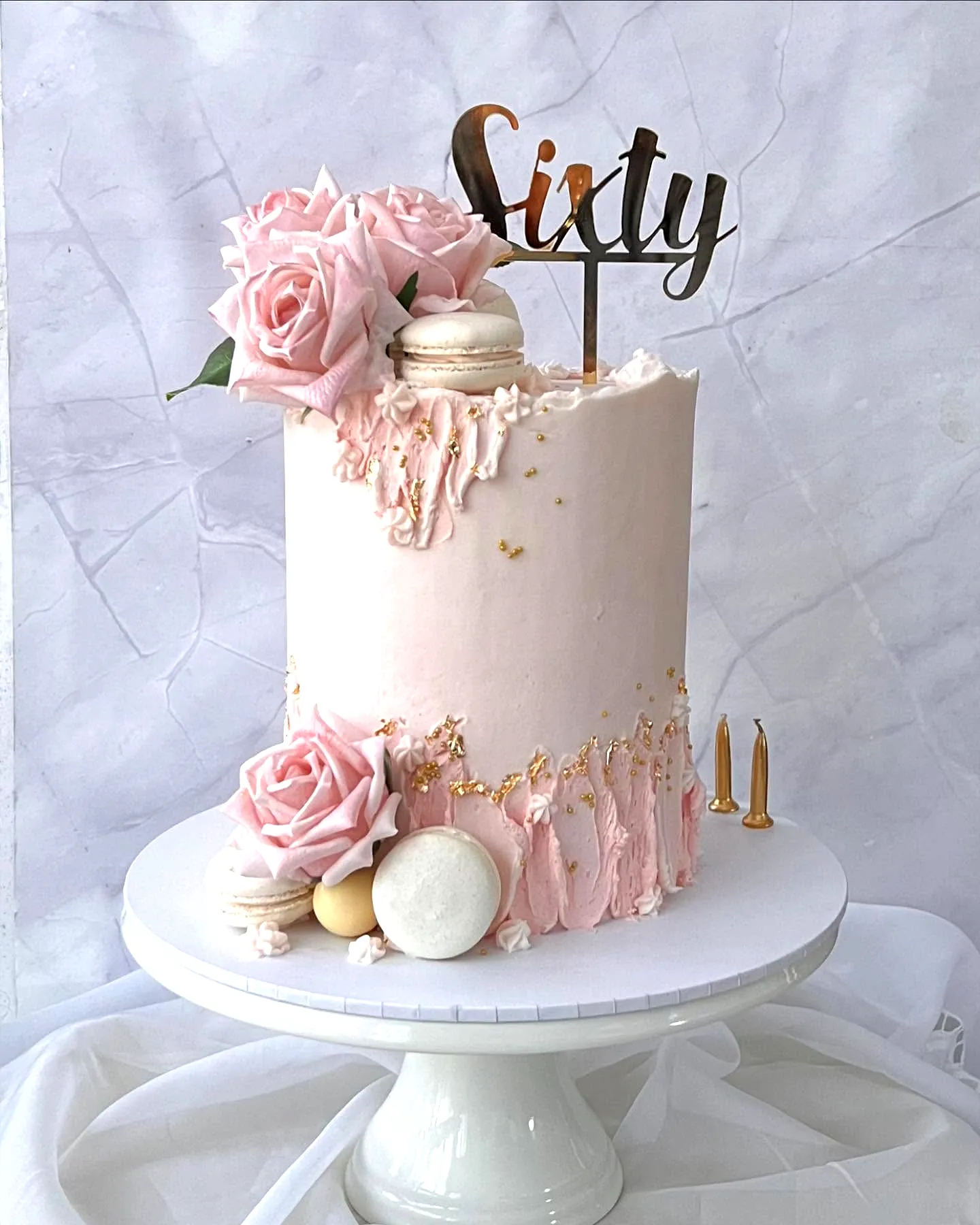 Charming 60th Birthday Cake with Elegant Pink Buttercream and Floral Accents