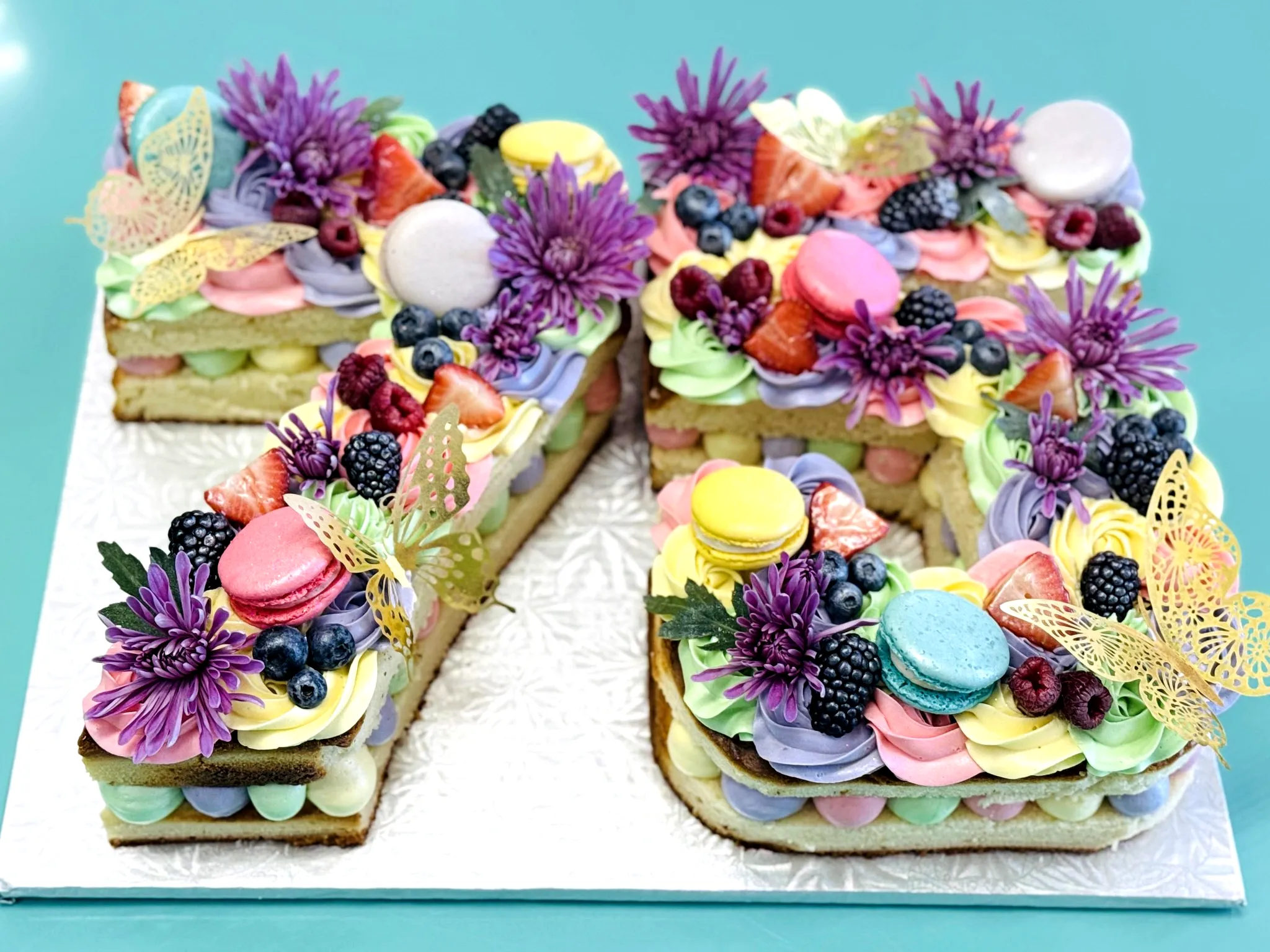 Charming 75th Birthday Cake Design with Pastel Buttercream and Fresh Fruits