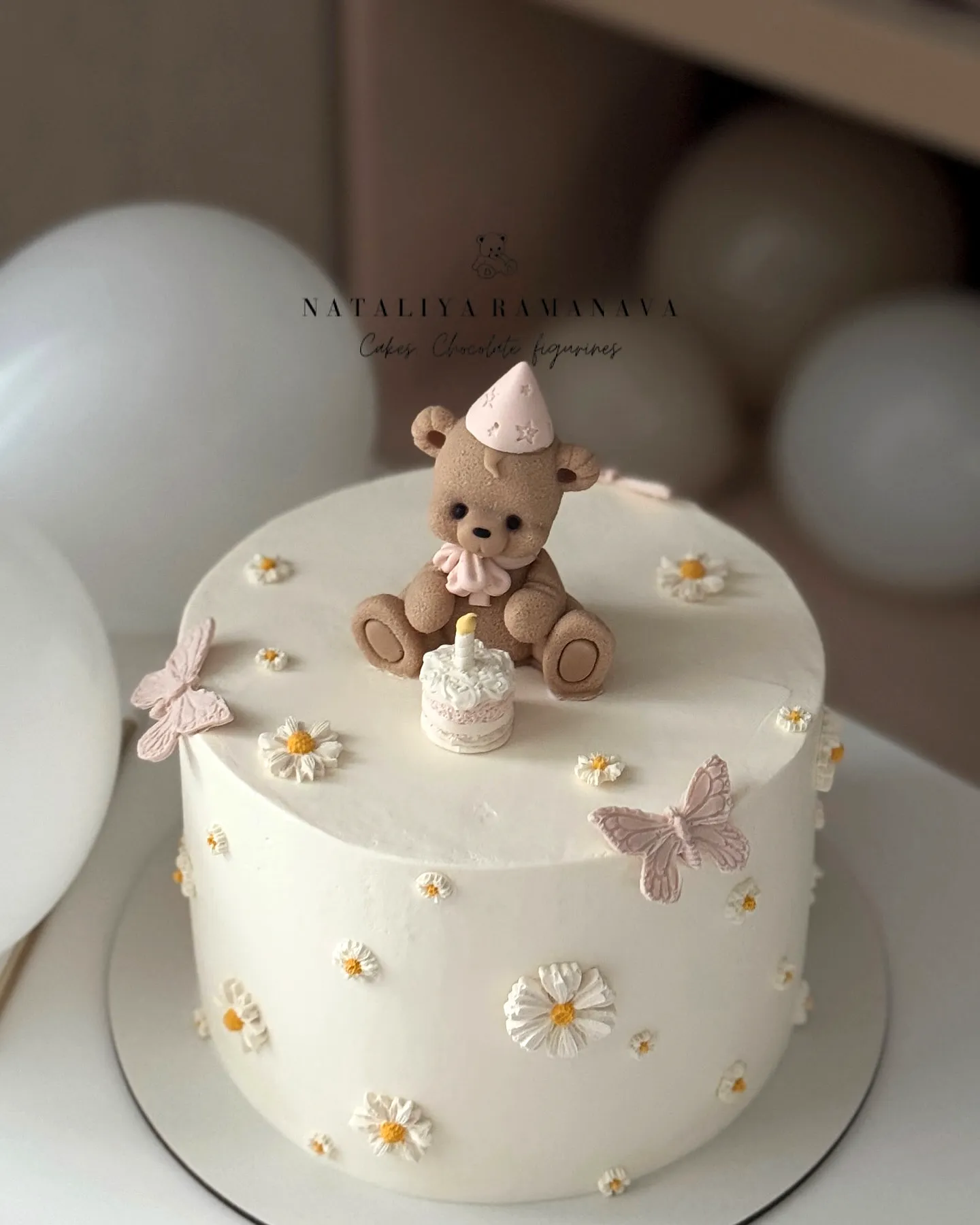 Charming Baby Shower Cake Design with Teddy Bear and Floral Decor