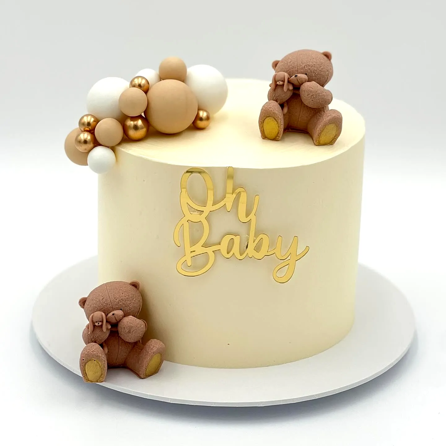 Charming Baby Shower Cake Featuring Minimalist Design and Cute Bear Decor