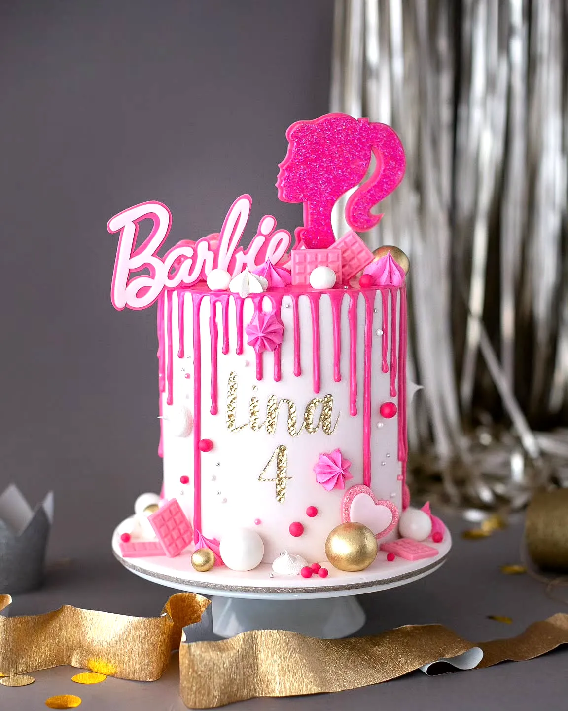 Charming Barbie Birthday Cake Design with Colorful Drip and Fun Accents