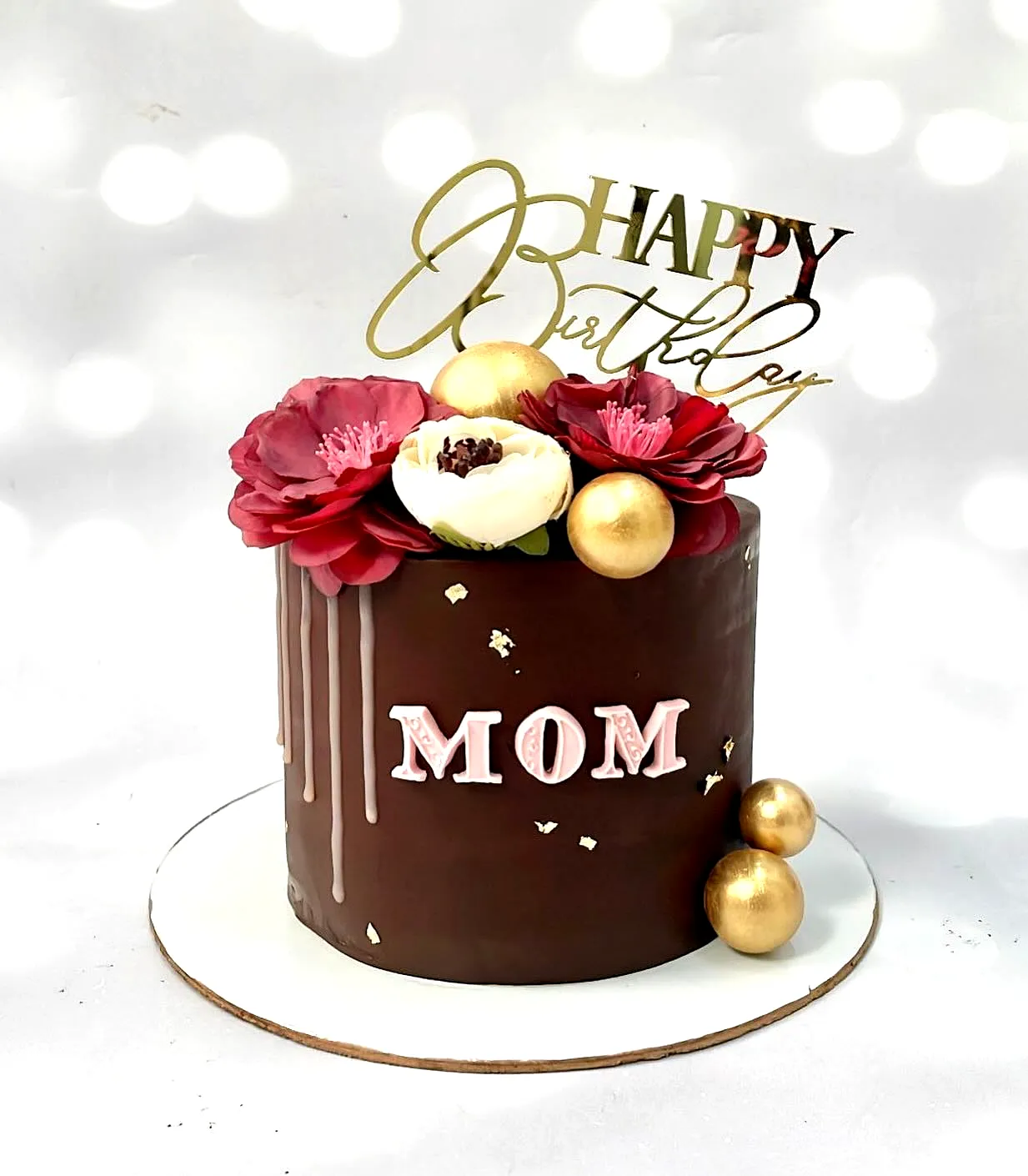 Charming Birthday Cake for Mom with Elegant Chocolate Drip and Floral Decor