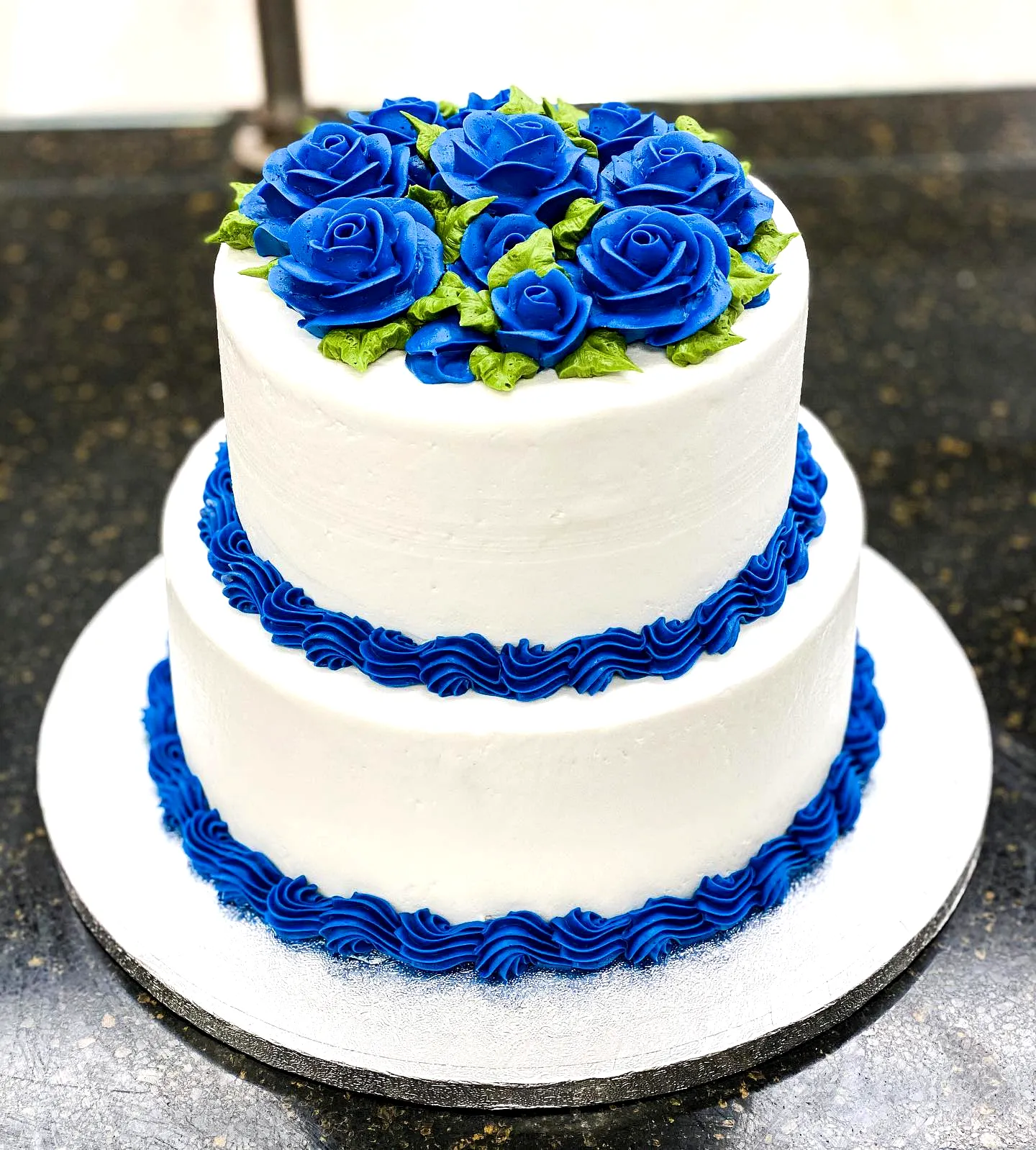Charming Blue Birthday Cake Design with Elegant Rose Decorations