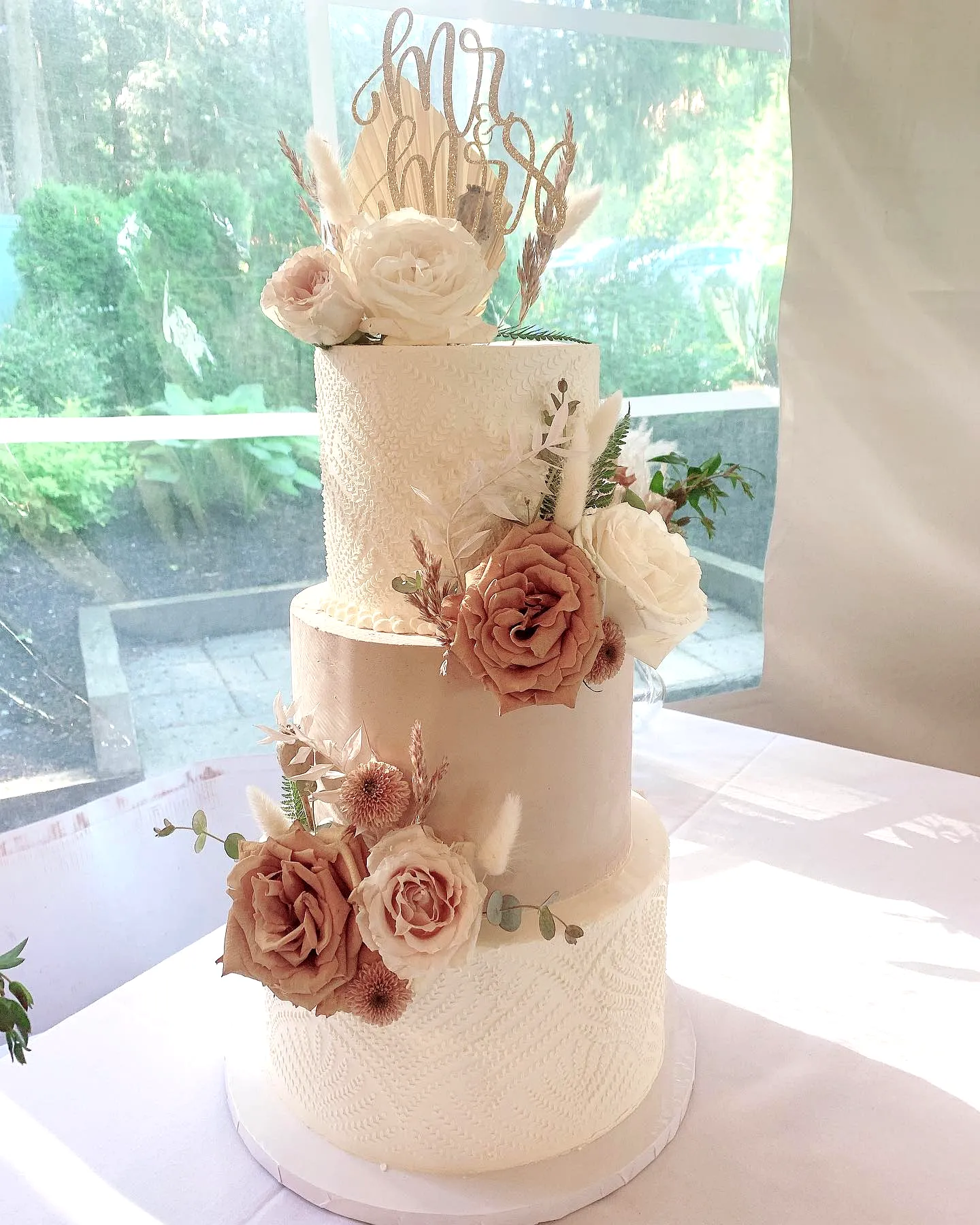 Charming Boho Wedding Cake with Lace and Dried Floral Accents