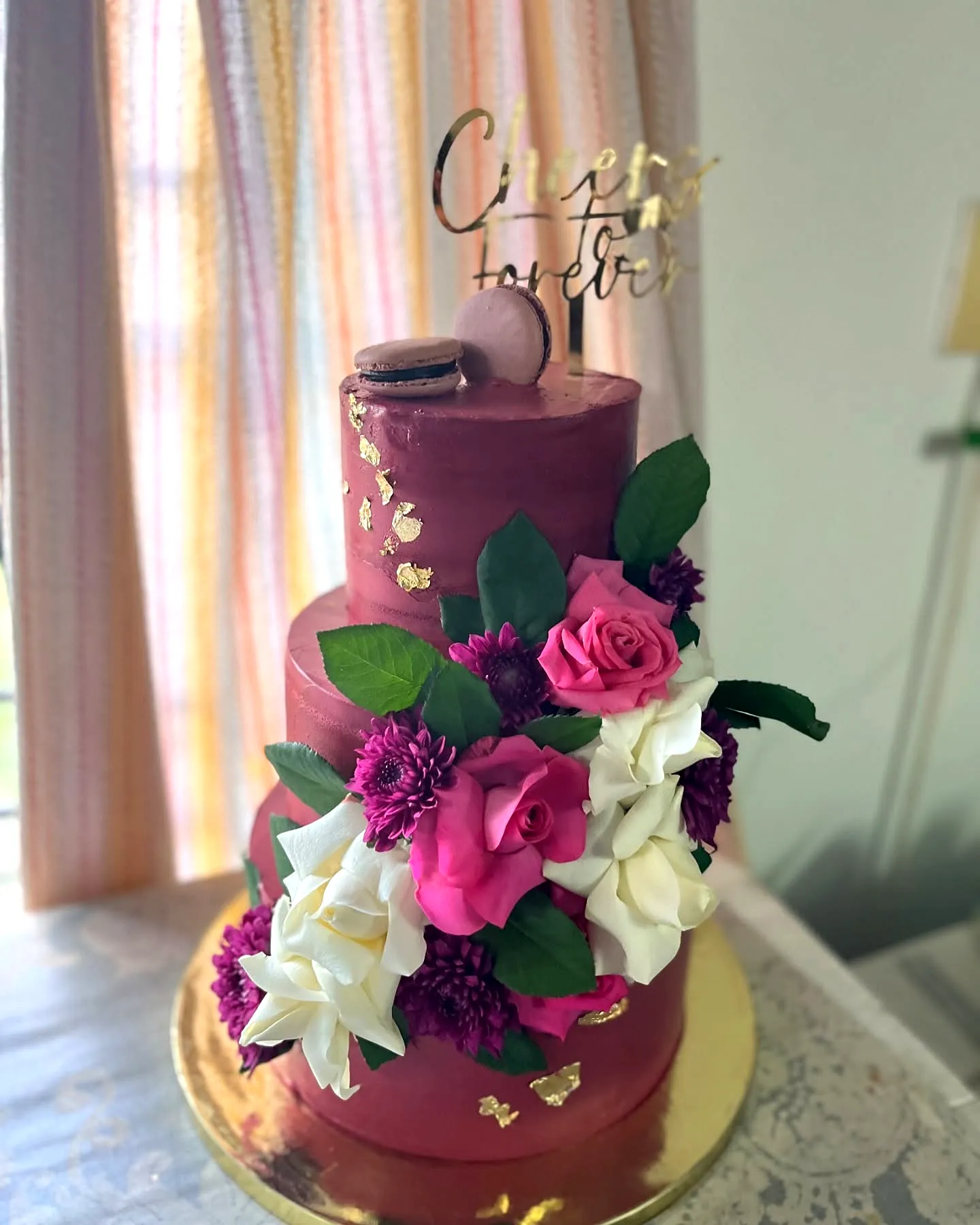 Charming Burgundy Wedding Cake Design with Elegant Floral Accents