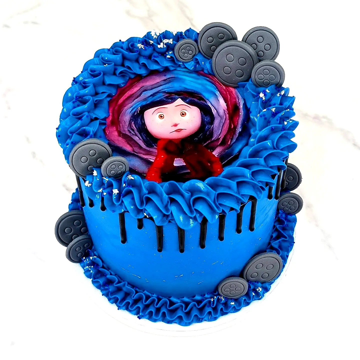 Charming Coraline Birthday Cake With Whimsical Outer Space Design