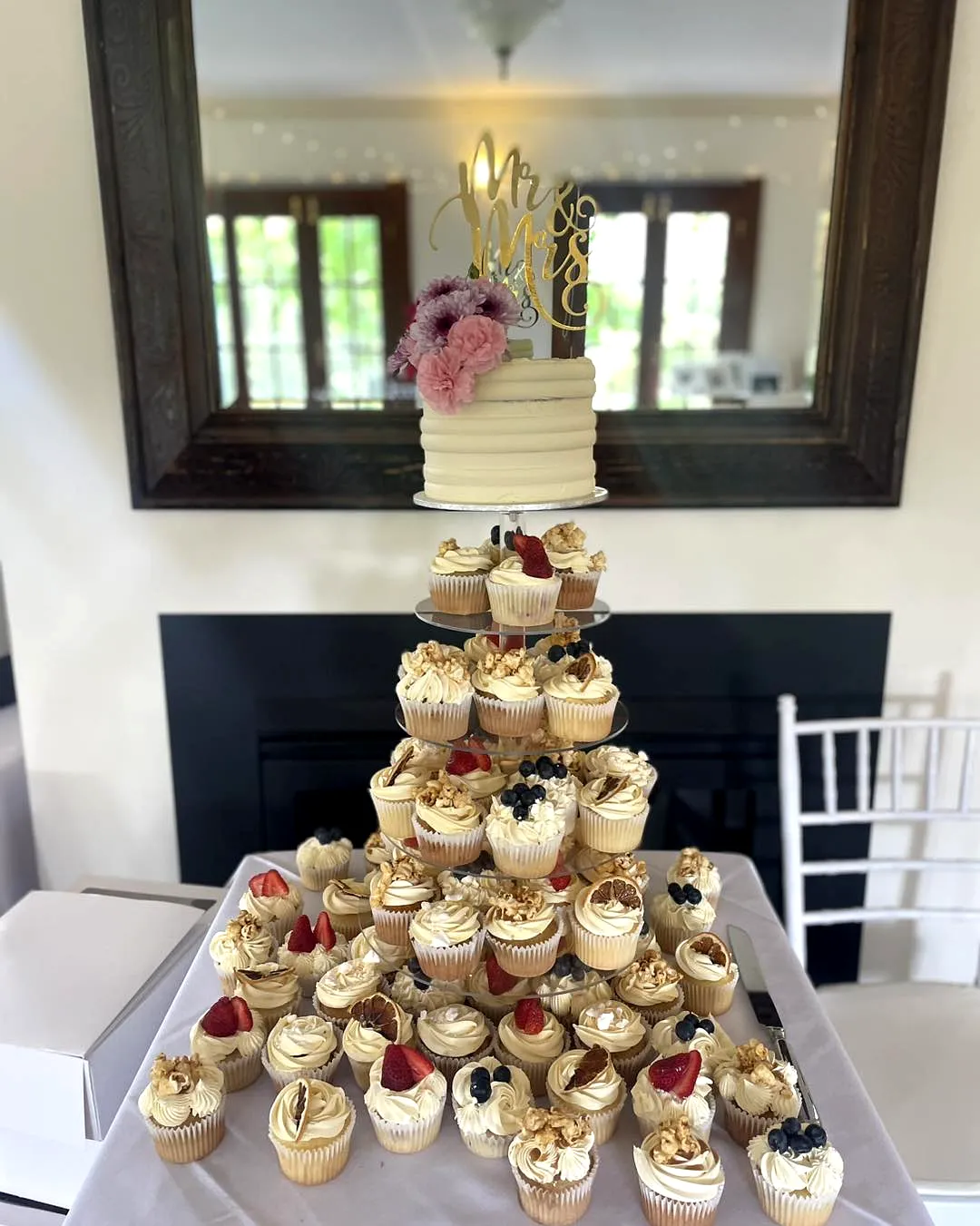 Charming Cupcake Wedding Cake Design with Elegant Touches and Colorful Accents
