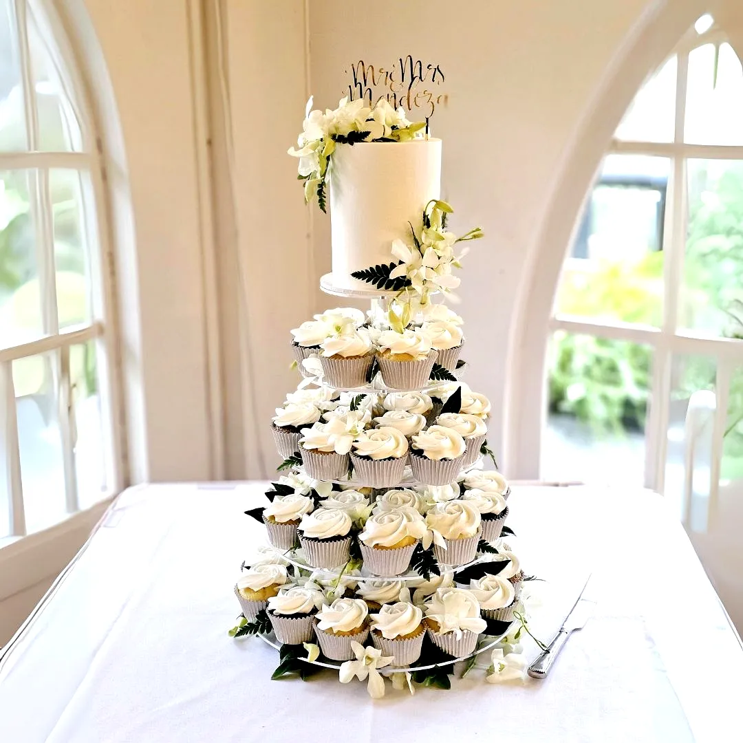 Charming Cupcake Wedding Cake Design with Floral Accents and Classic Elegance