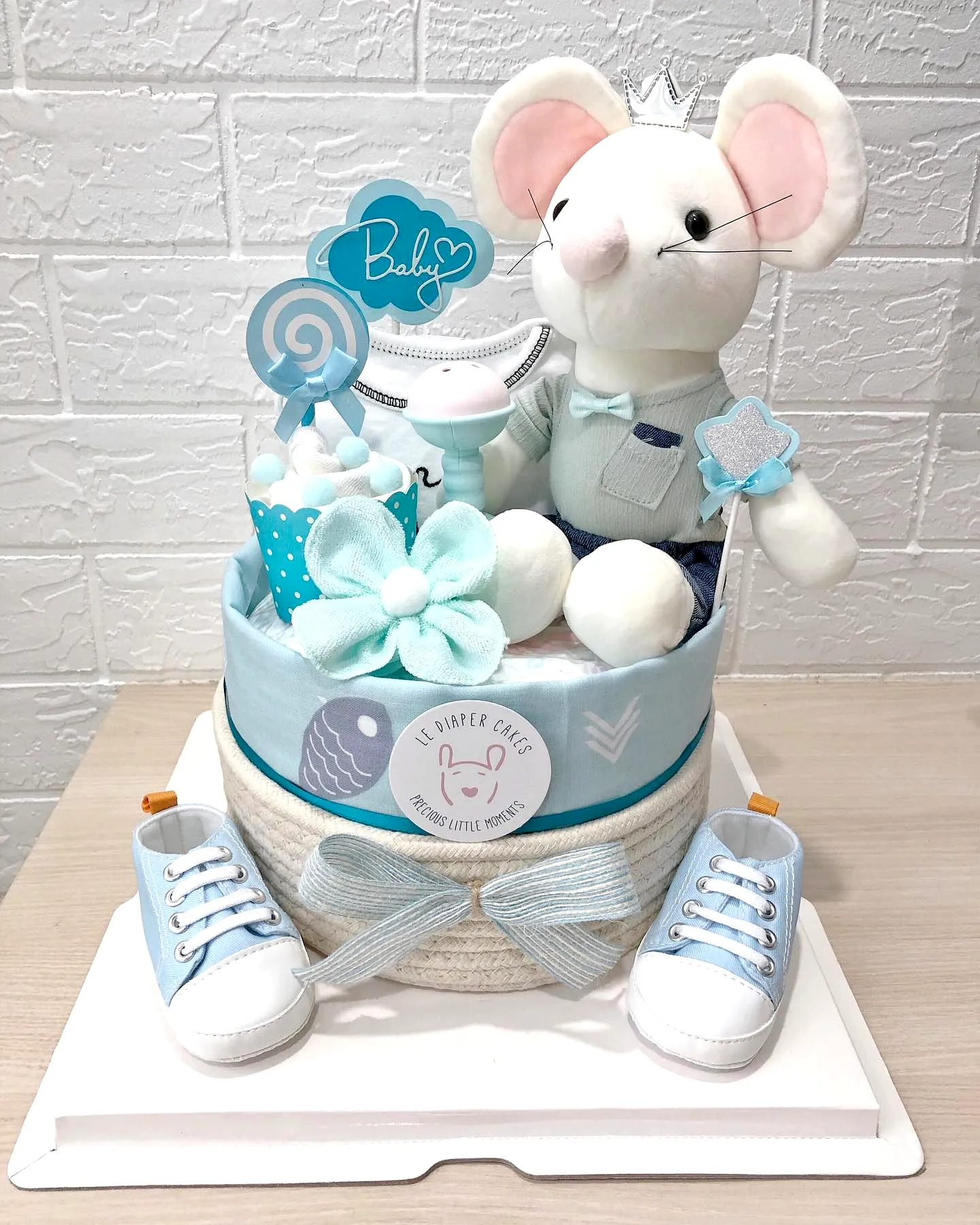 Charming Diaper Cake Design in Soft Blue and White for Baby Showers