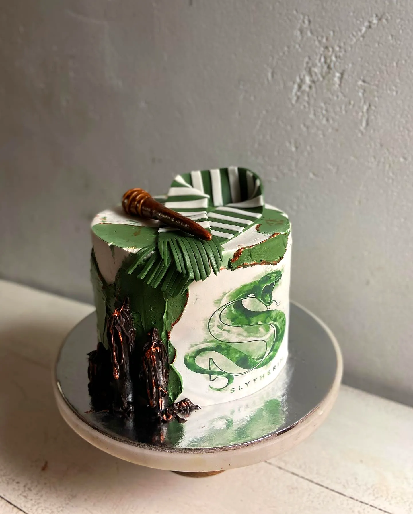 Charming Harry Potter Birthday Cake Featuring Slytherin Theme and Edible Decor