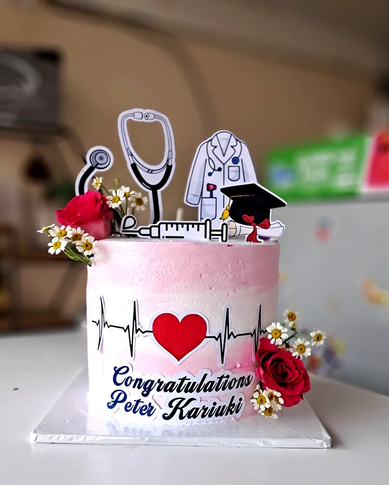 Charming Pink Graduation Cake for a Special Celebration
