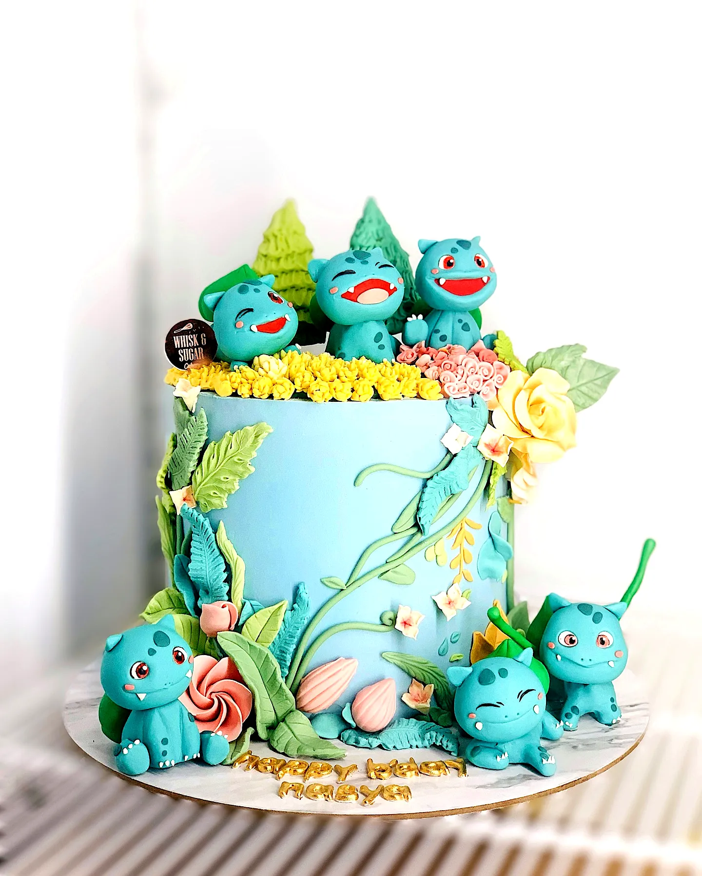 Charming Pokemon Cake Design Featuring Playful Bulbasaur and Vibrant Colors