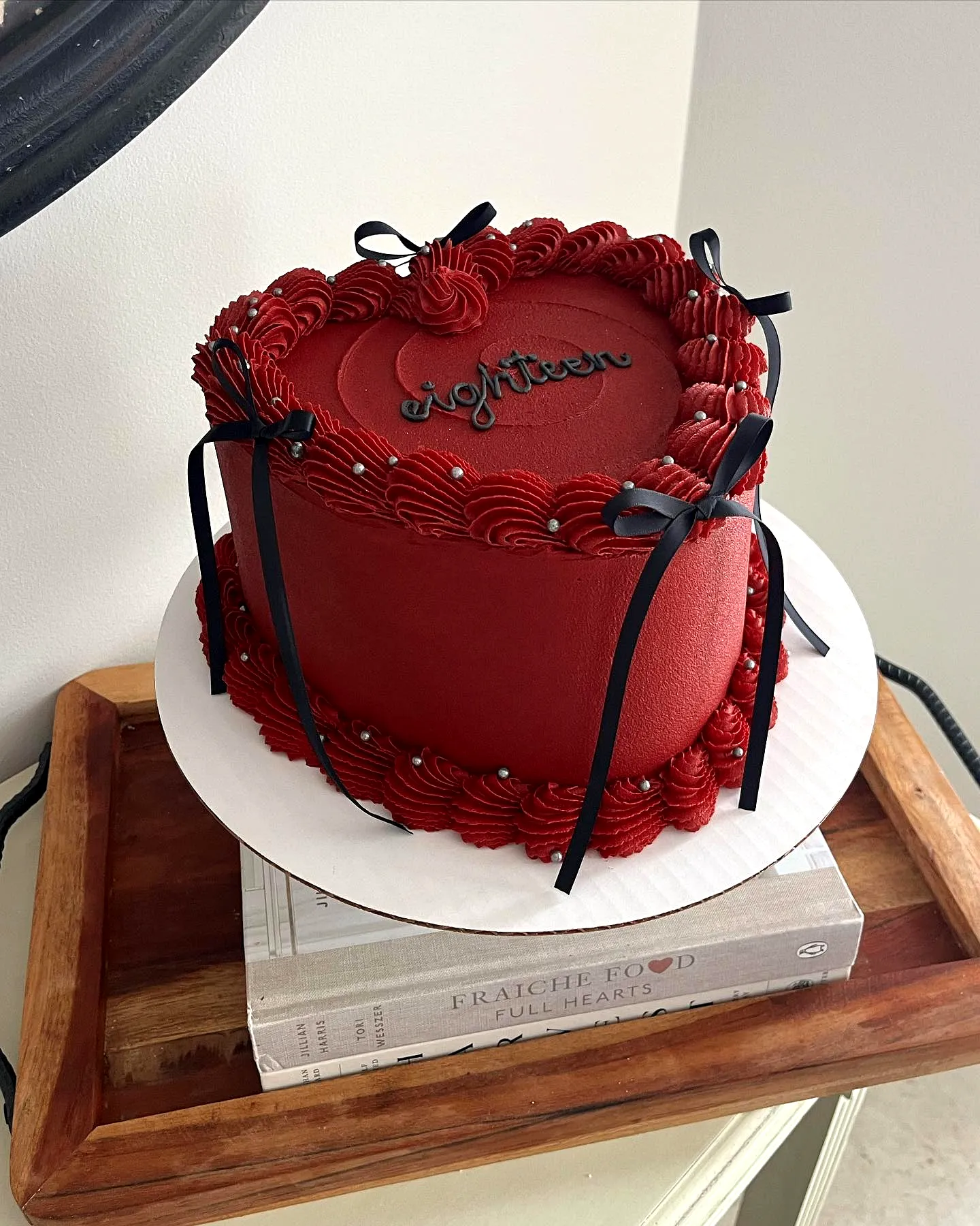 Charming Red and Black Birthday Cake Design for a Stylish Celebration