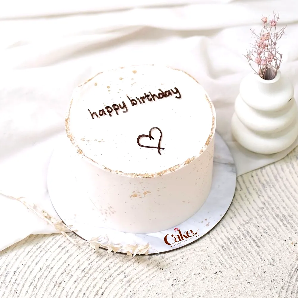 Charming Simple Birthday Cake Design with Elegant White Frosting and Heart Detail
