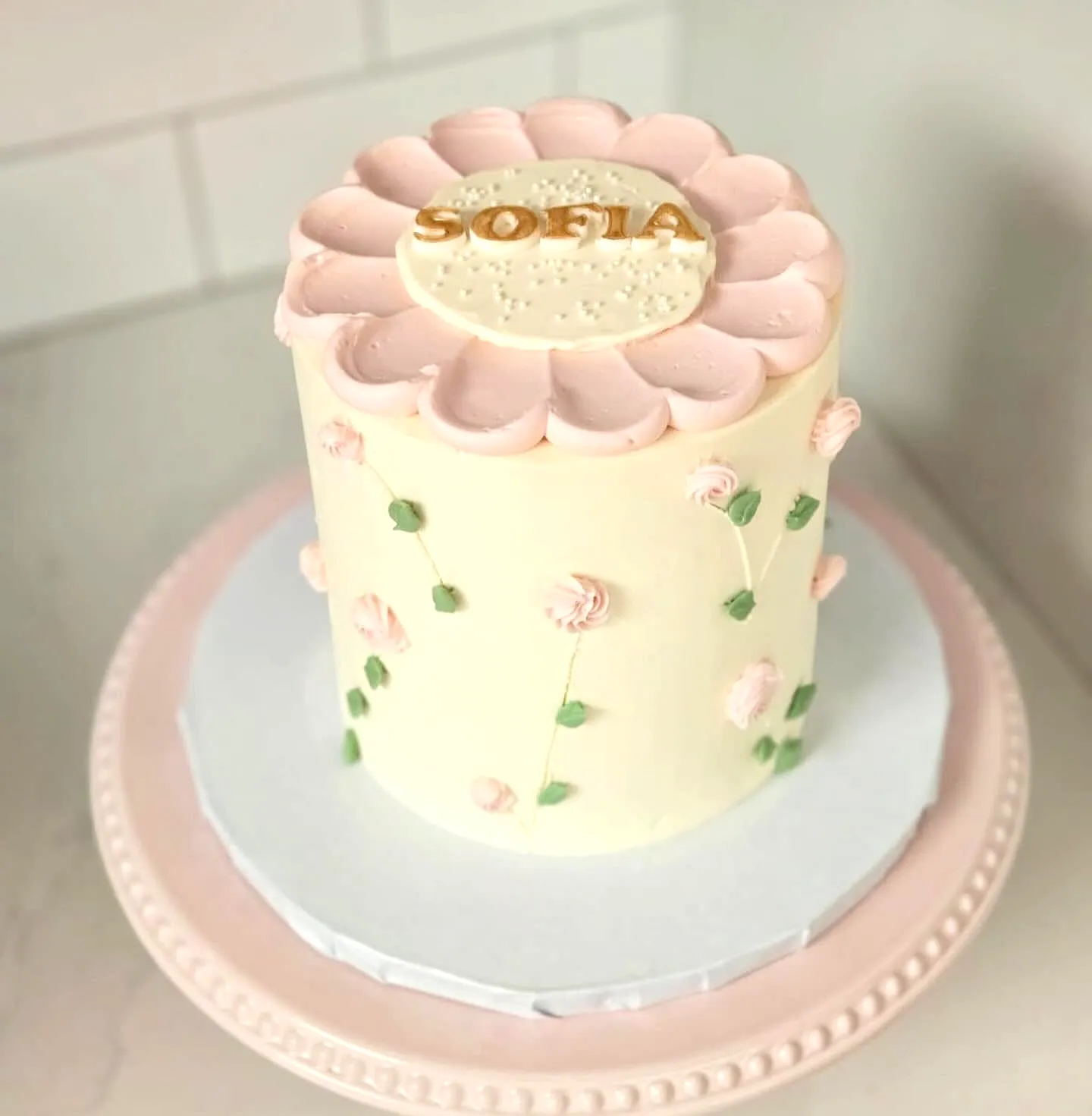 Charming Simple Birthday Cake Design with Pastel Colors and Floral Touches