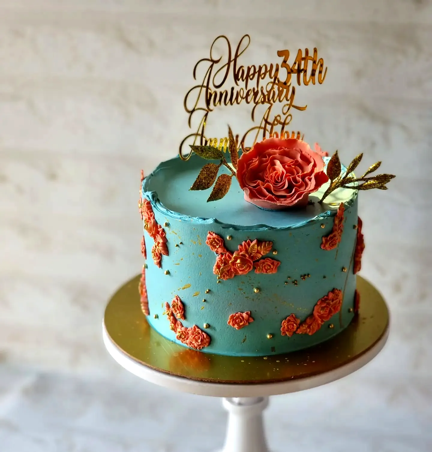 Charming Wedding Anniversary Cake Design with Blue Buttercream and Floral Accents