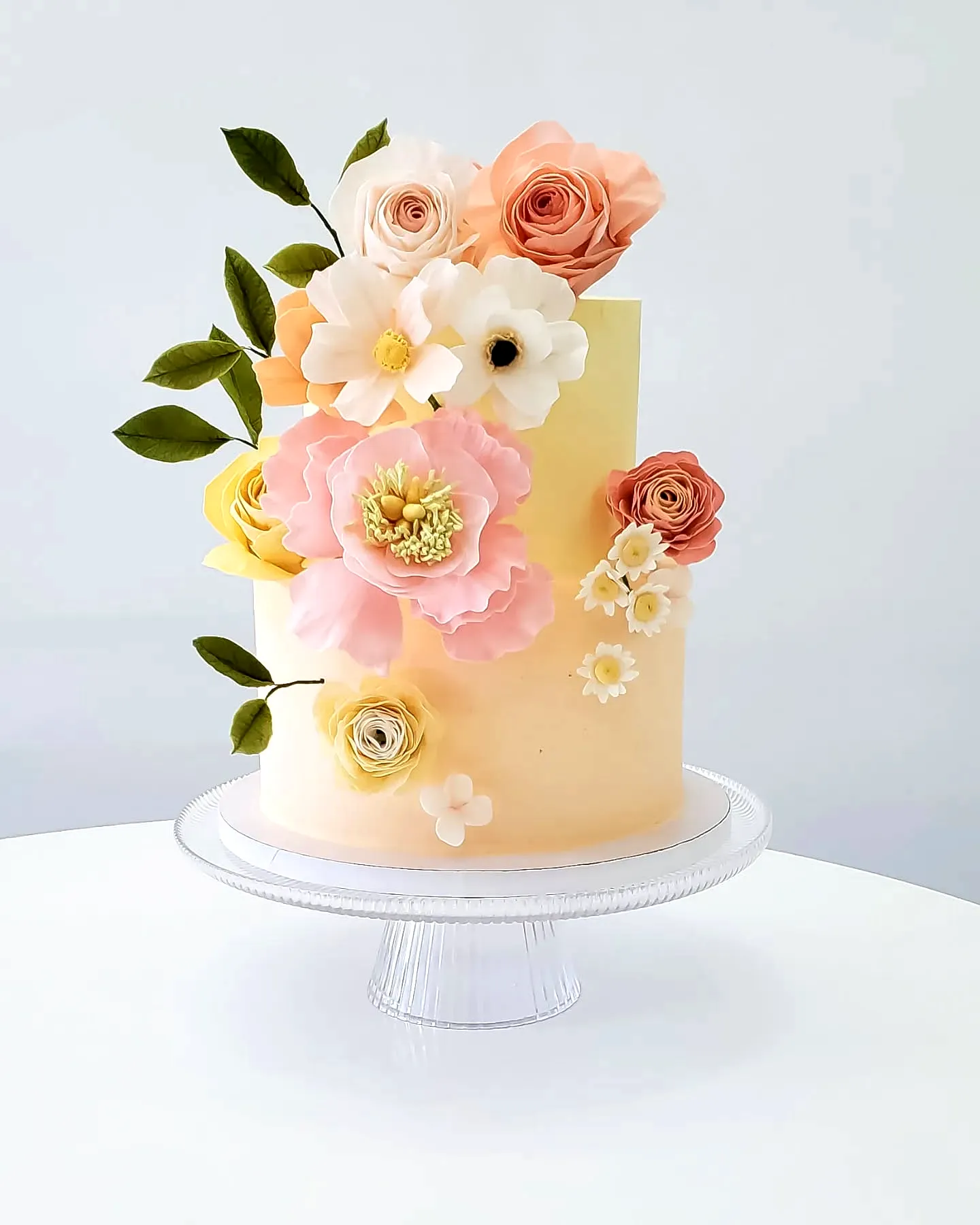 Charming Wedding Cake for Summer with Elegant Floral Design and Pastel Colors