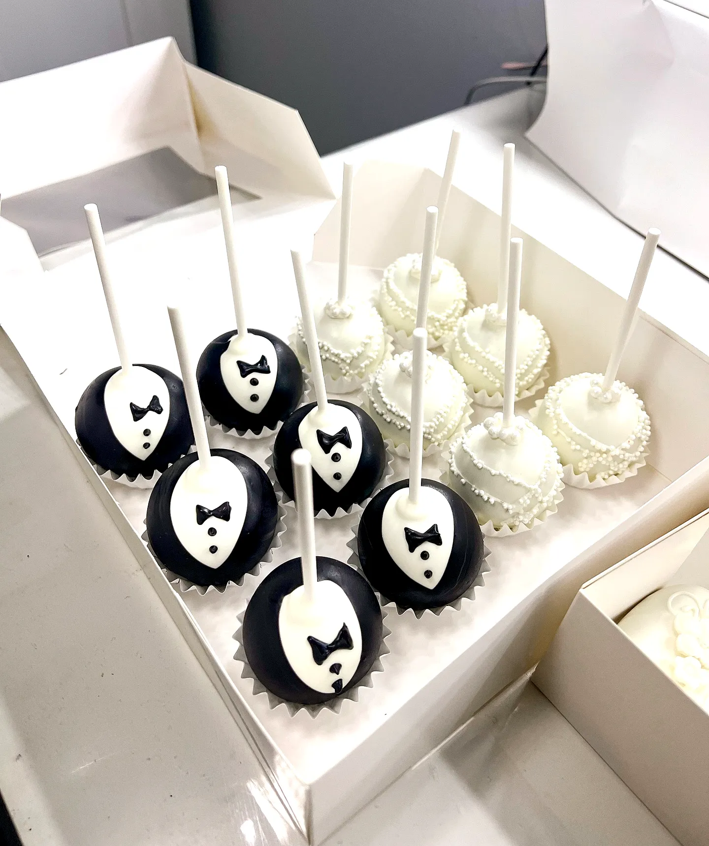 Charming Wedding Cake Pop Designs in Elegant Black and White Themes