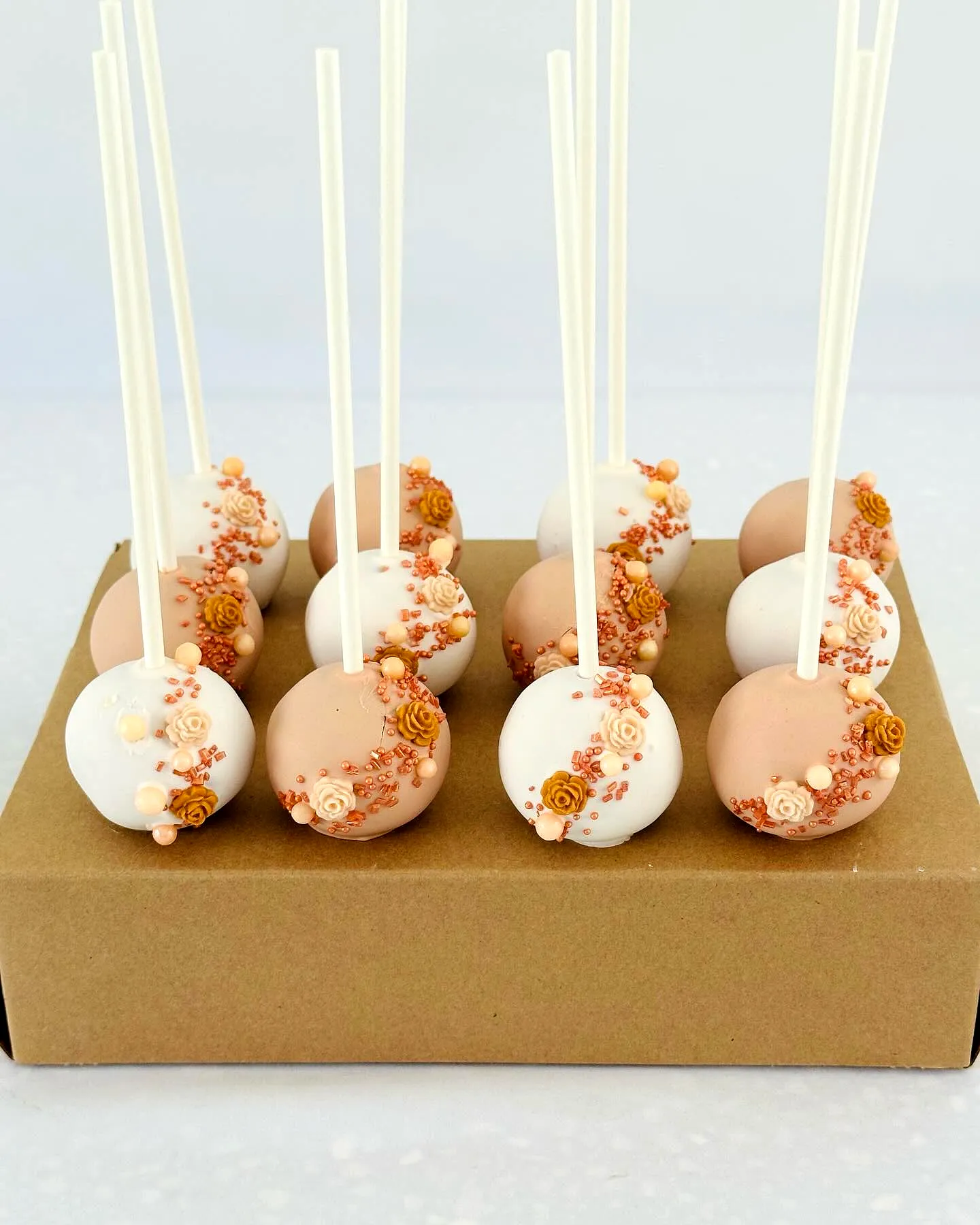 Charming Wedding Cake Pop Designs with Floral Touches in Soft Colors
