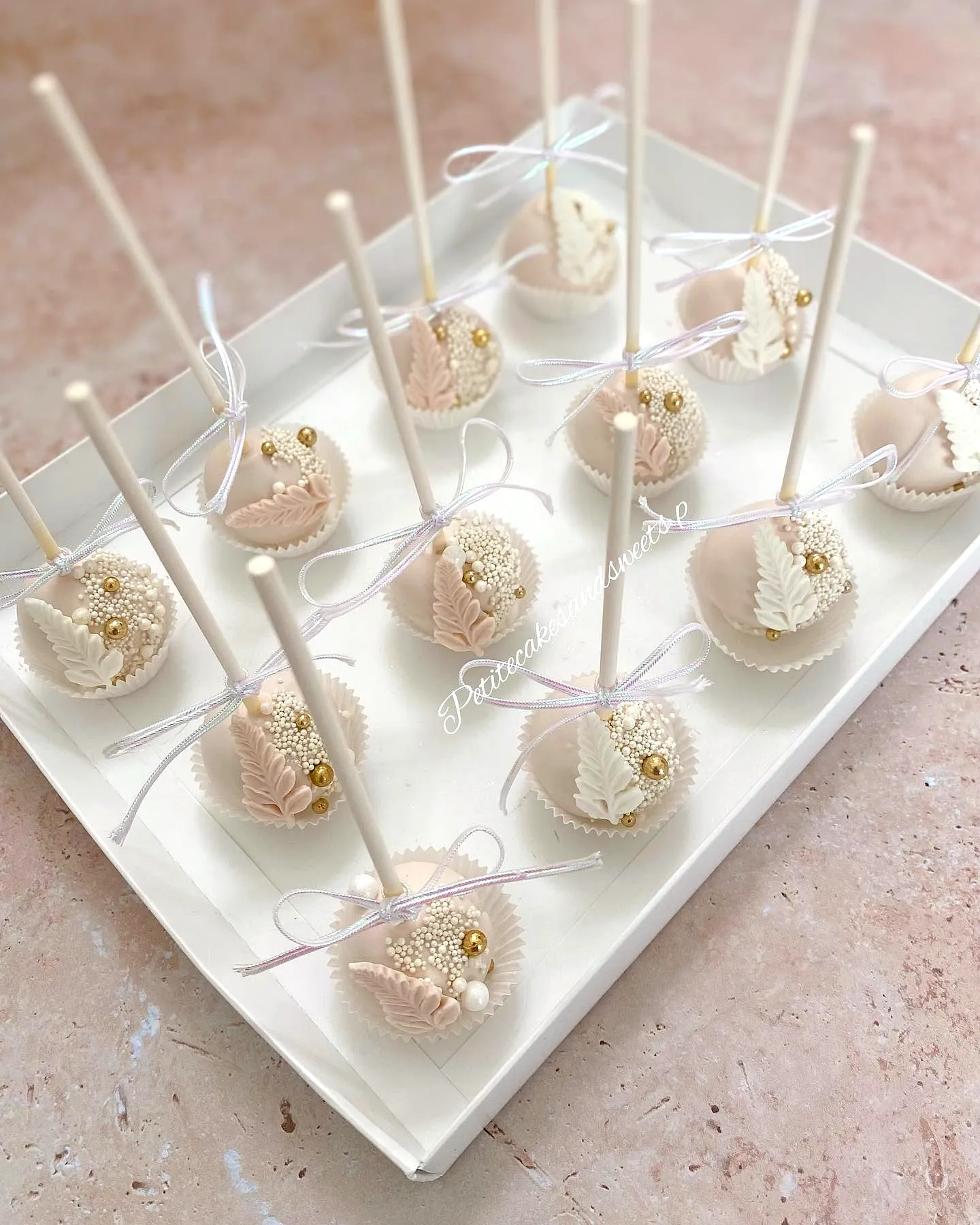 Chic and Elegant Wedding Cake Pop Design in Pastel Colors