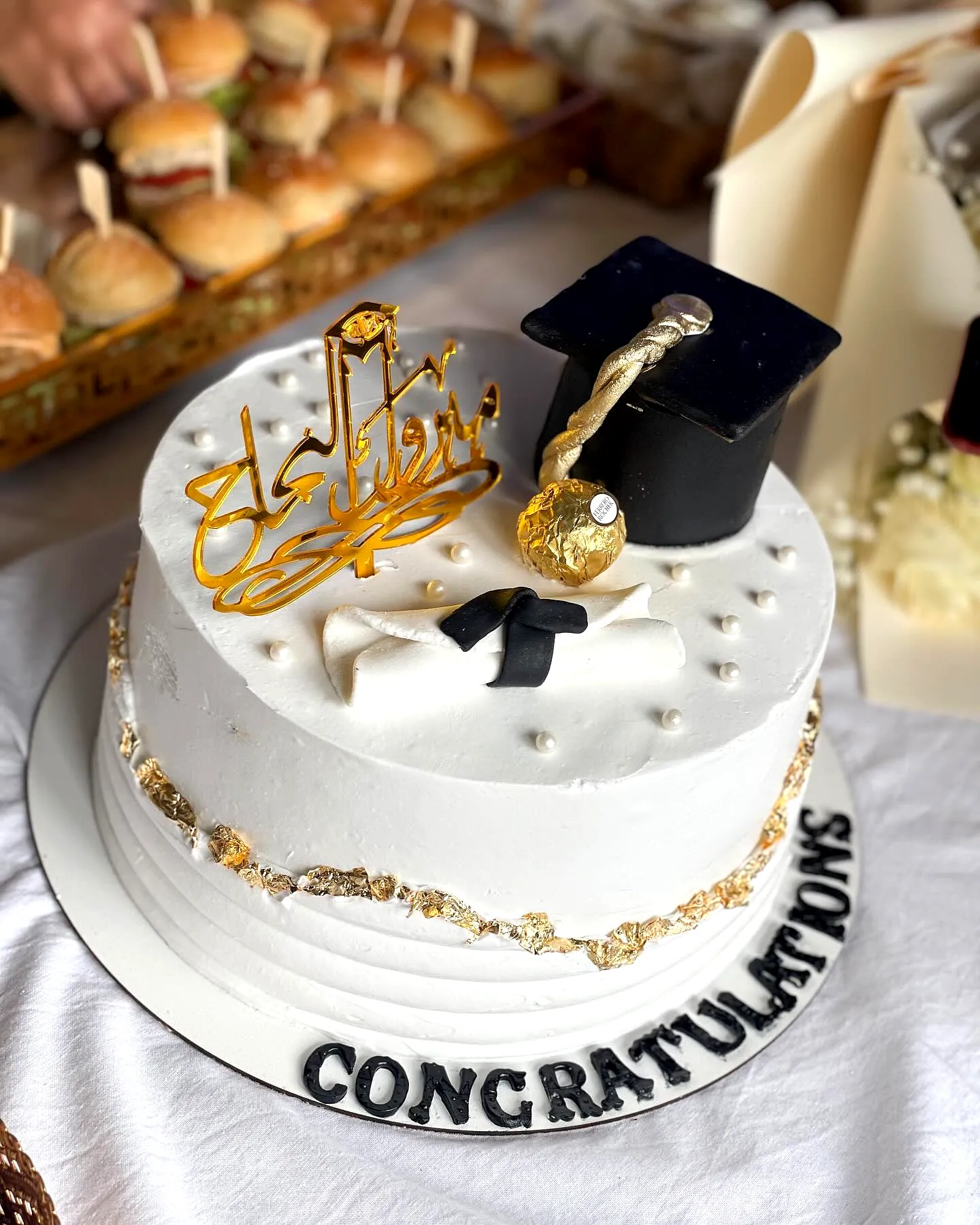 Chic Black and Gold Graduation Cake Design for a Memorable Celebration