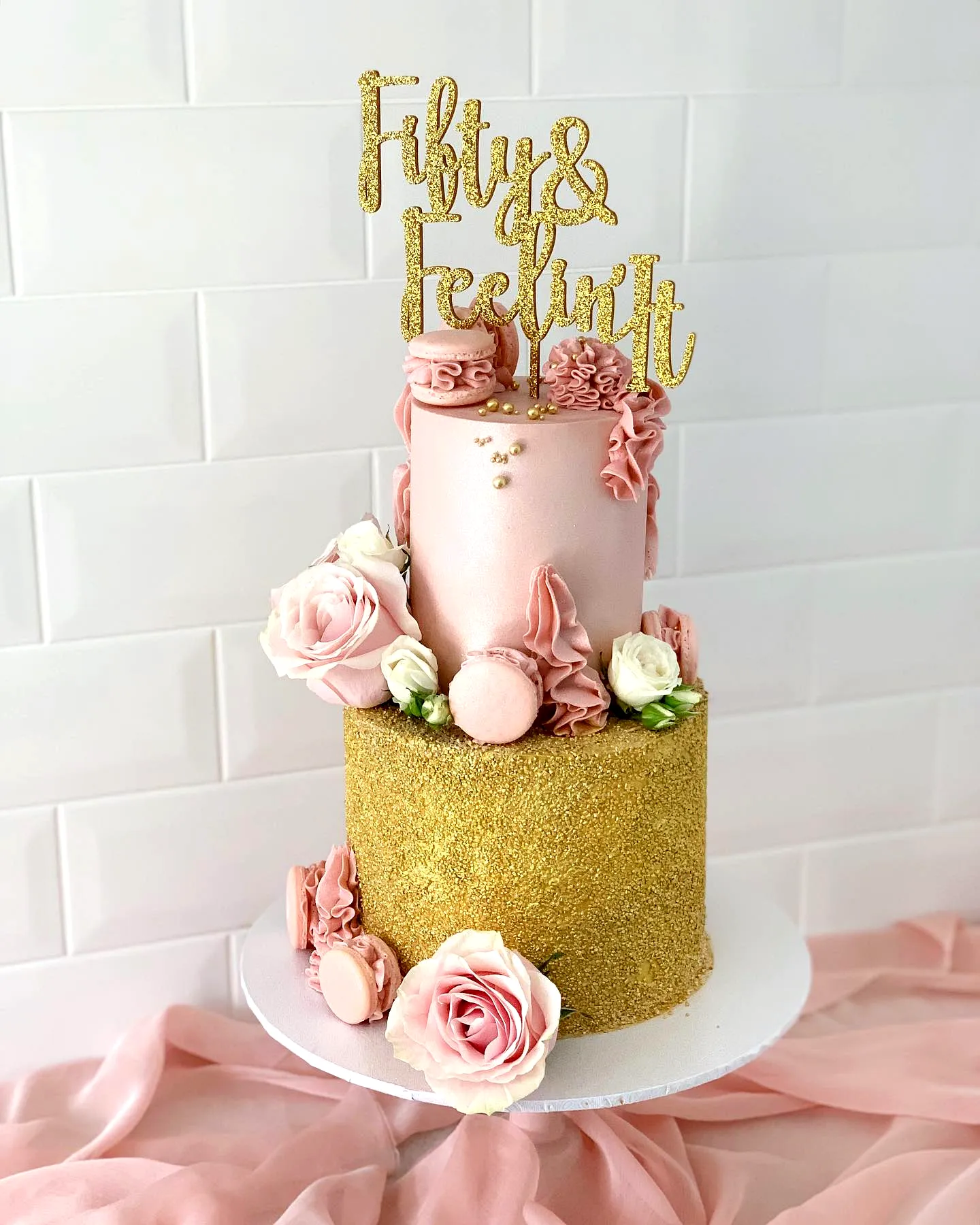 Chic Pink and Gold 50th Birthday Cake Design for a Stylish Celebration