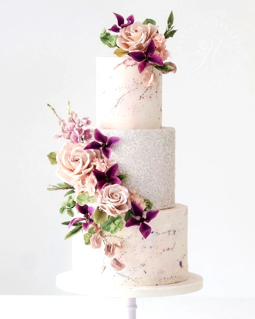 Chic Three Tier Wedding Cake with Elegant Texture and Soft Pastel Accents