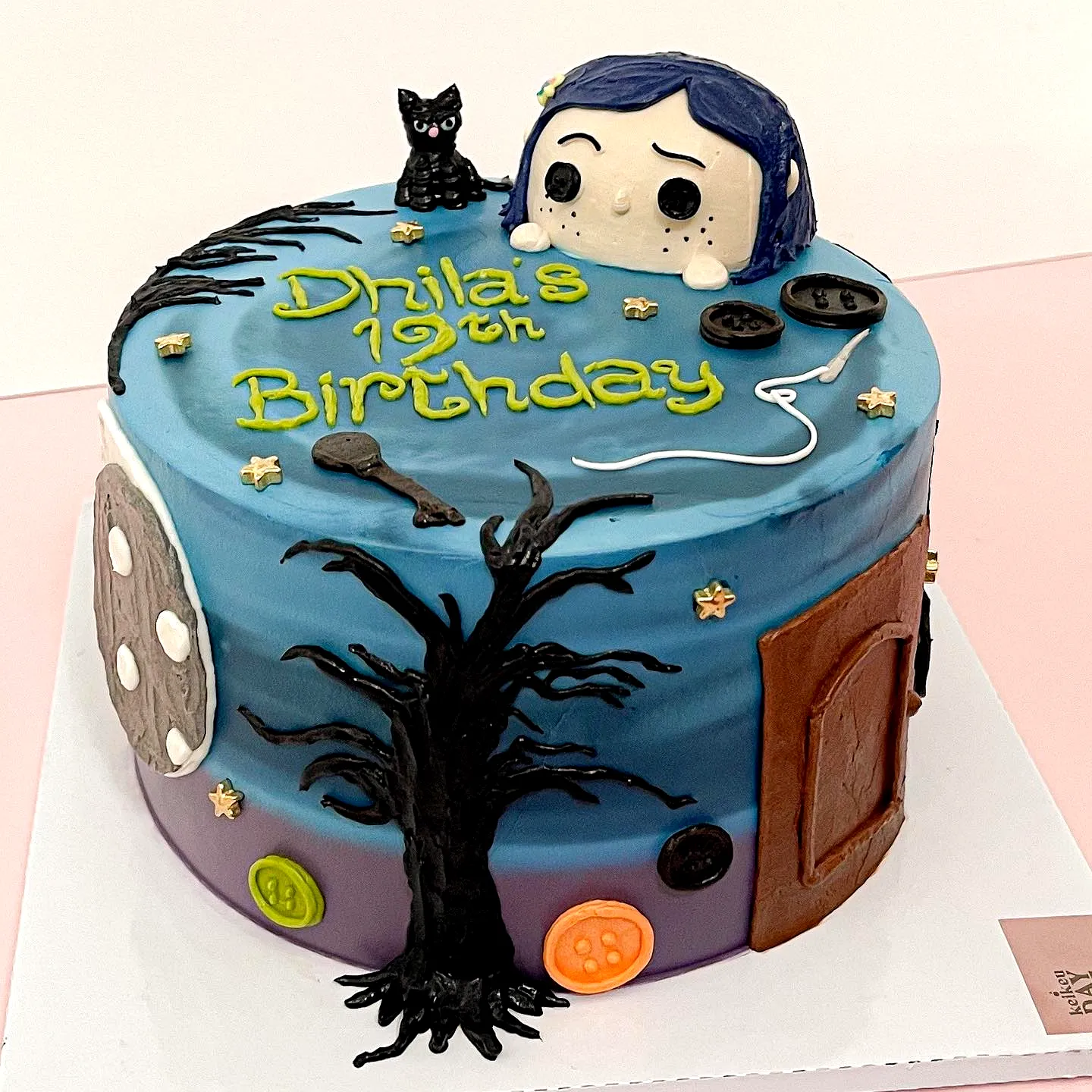 Colorful and Whimsical Coraline Birthday Cake Design for Dhilas 19th Celebration