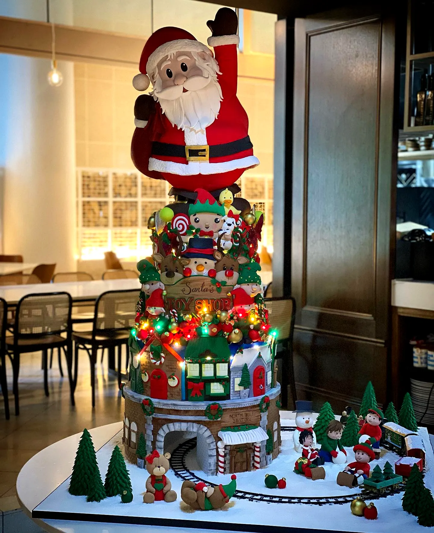 Colorful Christmas Birthday Cake Design with Gingerbread House Charm