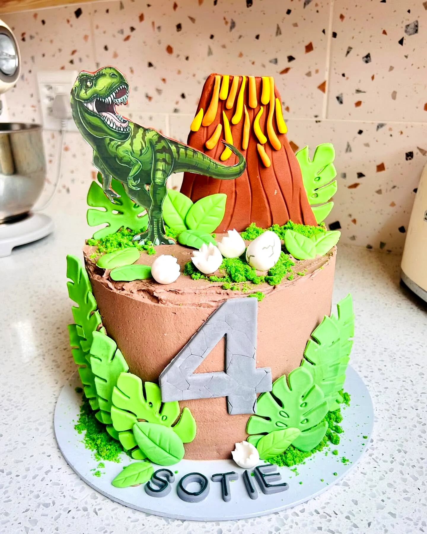 Colorful Dinosaur Birthday Cake for an Adorable Celebration