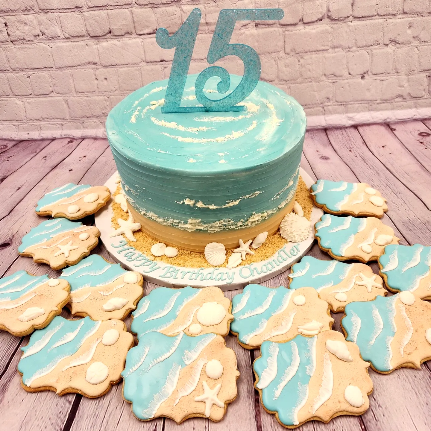 Creative 15th Birthday Cake with Turquoise Ocean Waves and Shell Decor
