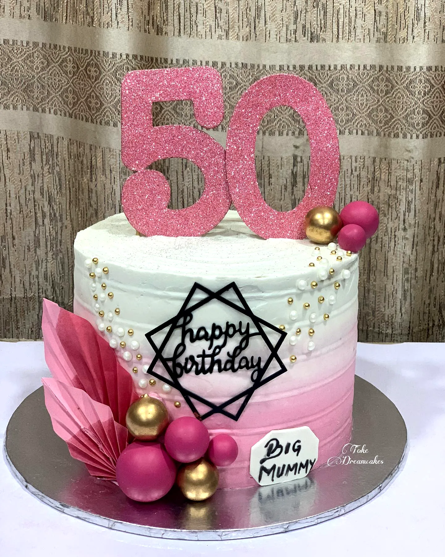 Creative 50th Birthday Cake Ideas for Women with Ombre Pink and White Design